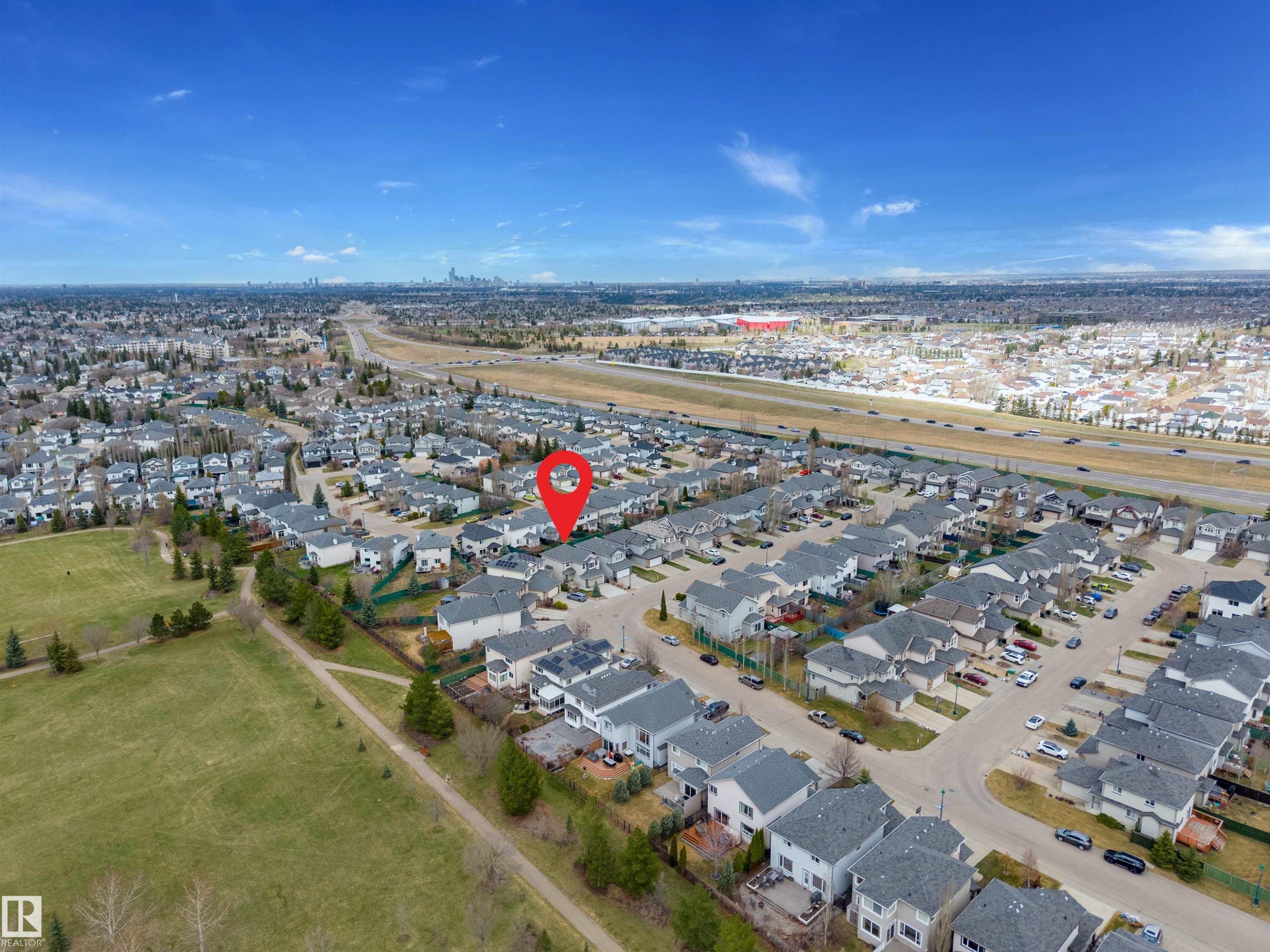 Aerial perspective showcasing a residential area with a prominent green space - 2340 Hagen Link, Edmonton, AB - Outdoor With View