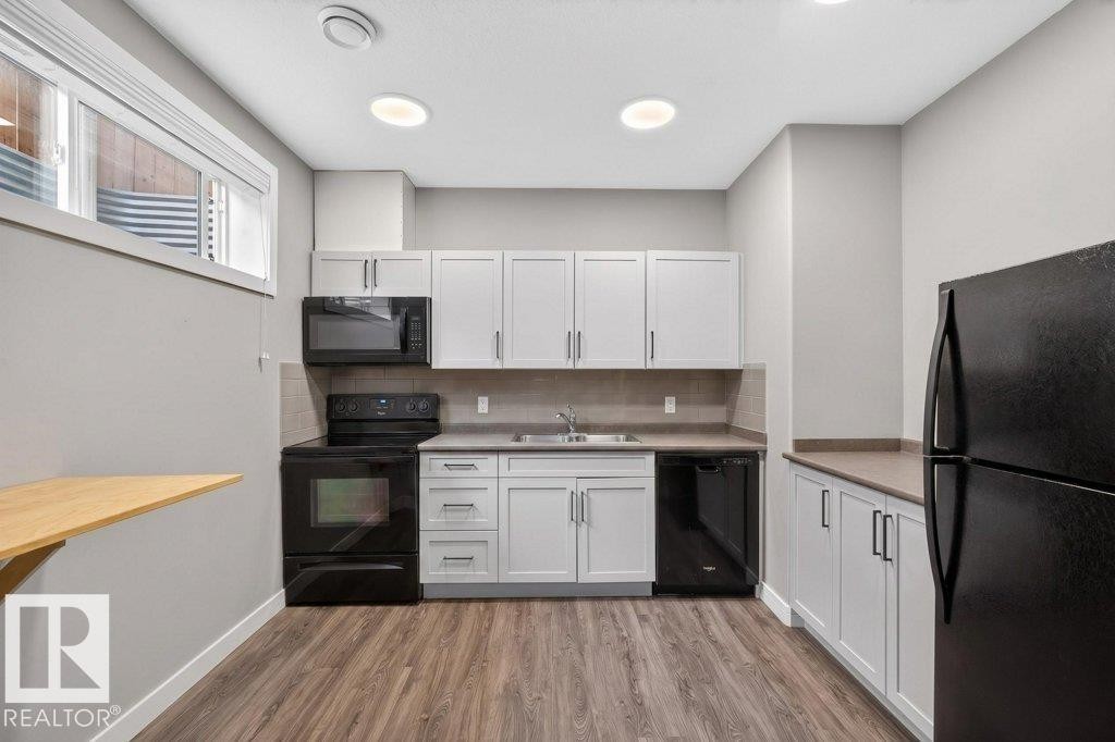 1363 Adamson Drive, Edmonton, AB - Indoor Photo Showing Kitchen With Double Sink