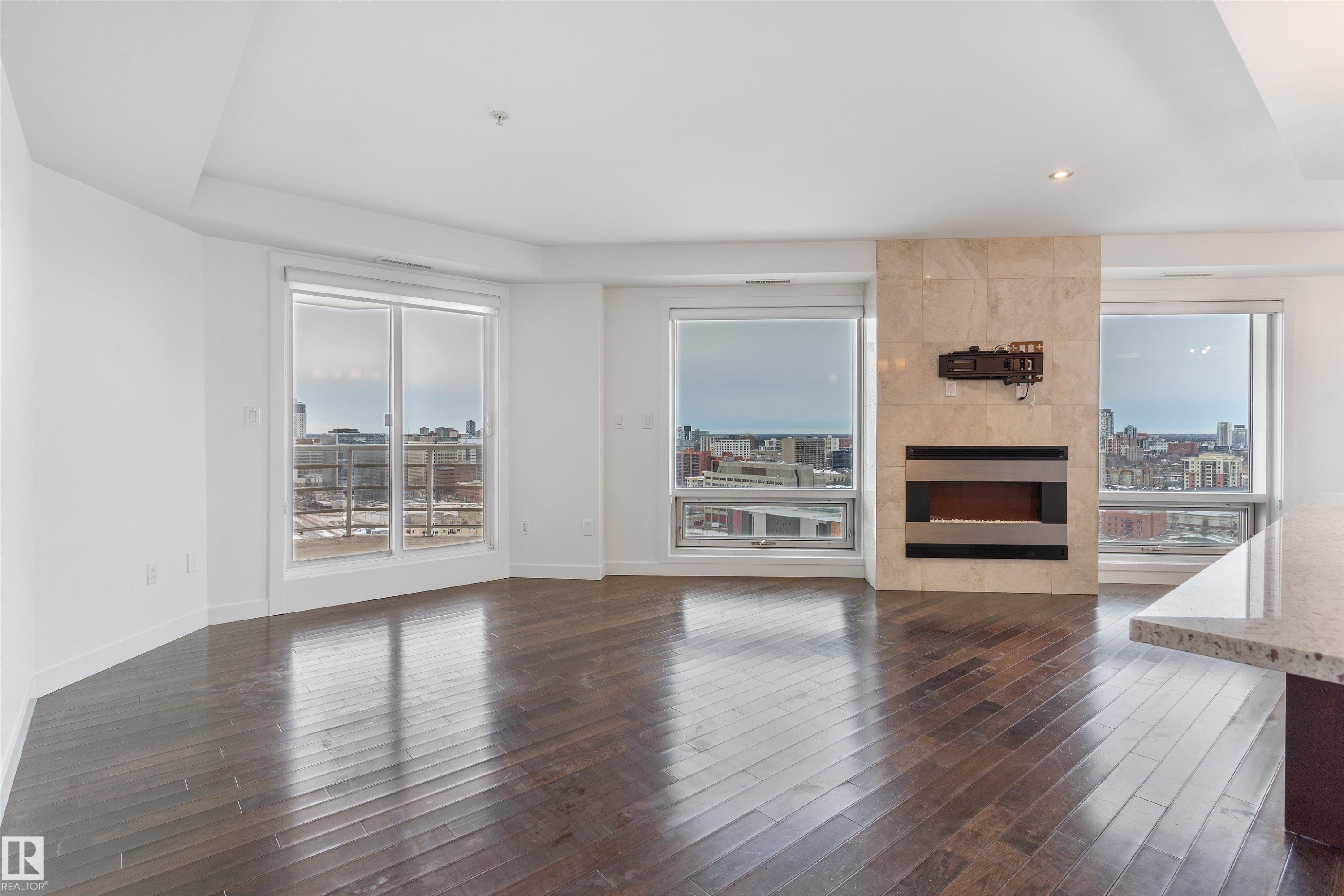 #1901 10388 105 St Nw, Edmonton, AB - Indoor Photo Showing Living Room With Fireplace