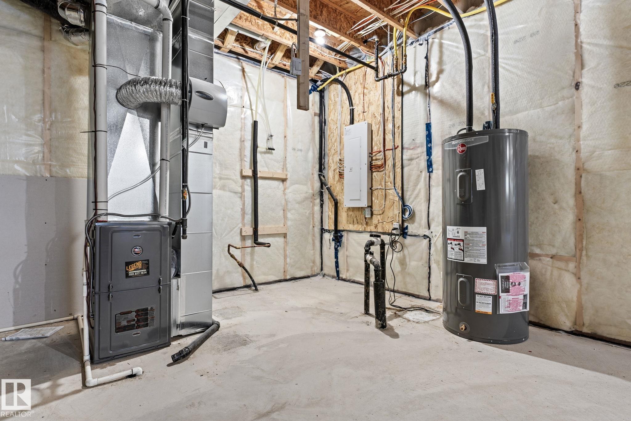 Utility room with a furnace and water heater - 11019 132 St, Edmonton, AB - Indoor Photo Showing Basement
