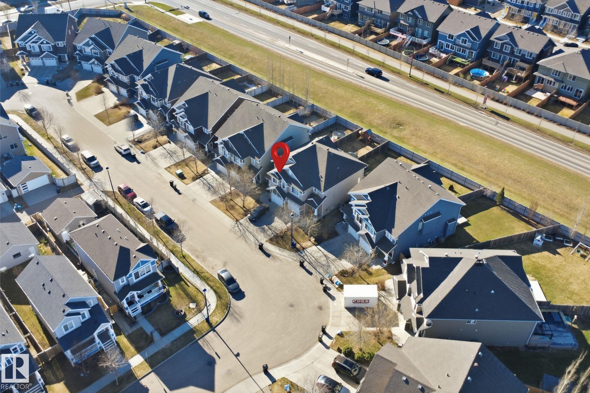 Aerial perspective highlighting a residential property within a structured neighborhood - 7323 24 Ave, Edmonton, AB - Other