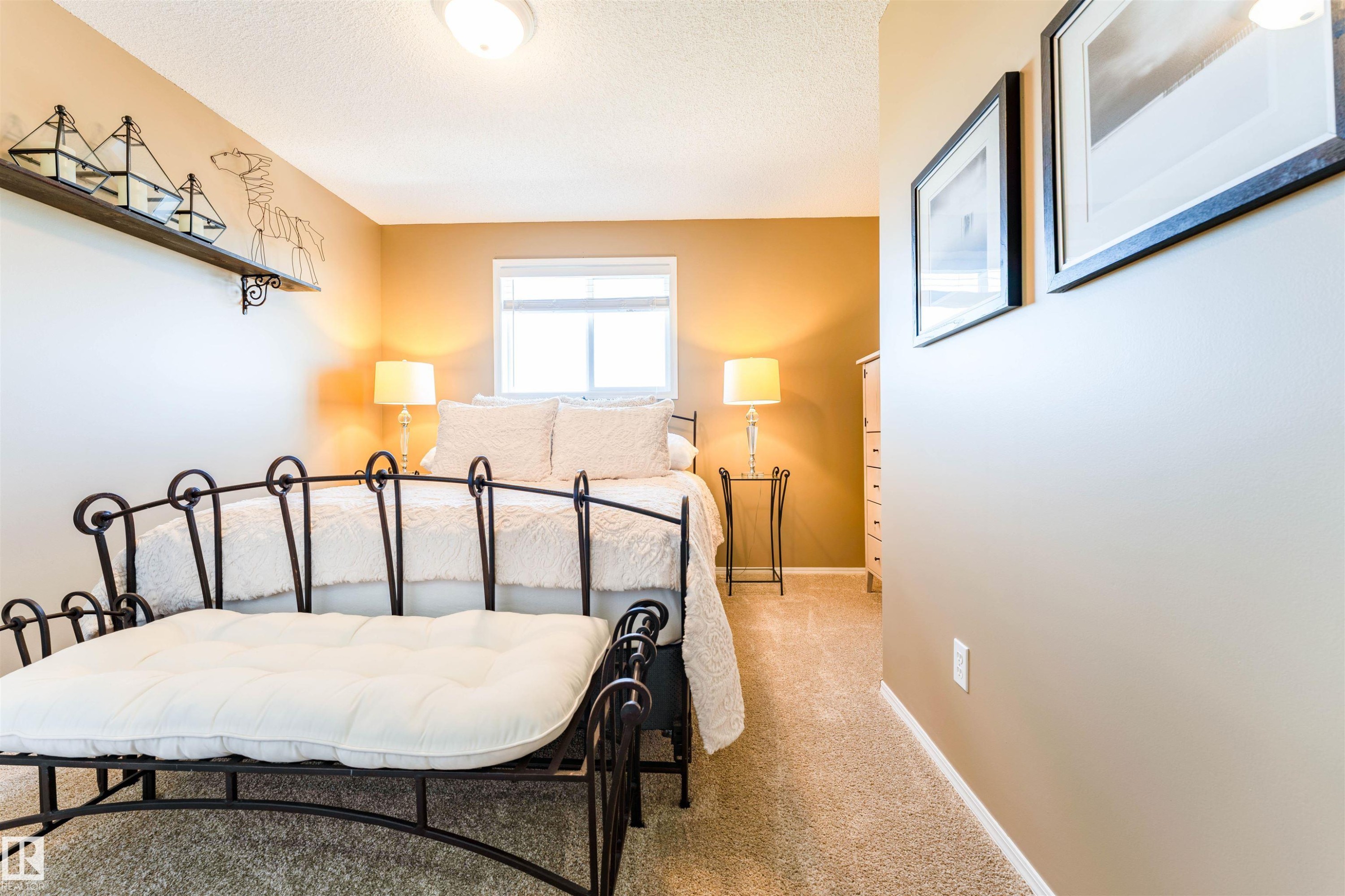 Carpeted room featuring a double-pane window, flush-mount lighting, and neutral wall tones - 847 Blacklock Way, Edmonton, AB - Indoor