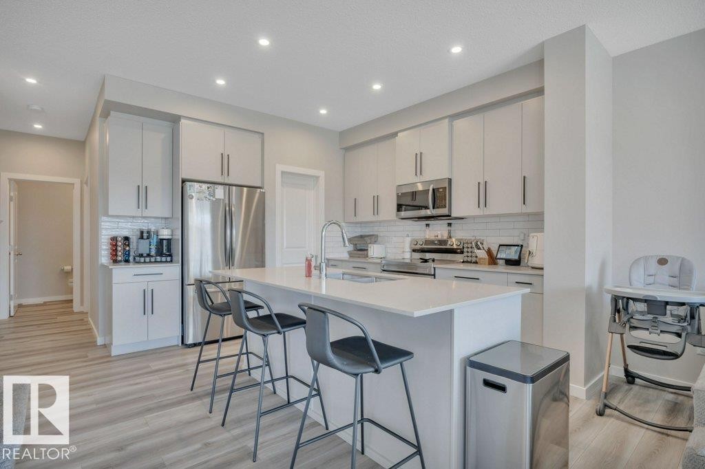 161 Larch Crescent, Leduc, AB - Indoor Photo Showing Kitchen With Stainless Steel Kitchen With Upgraded Kitchen