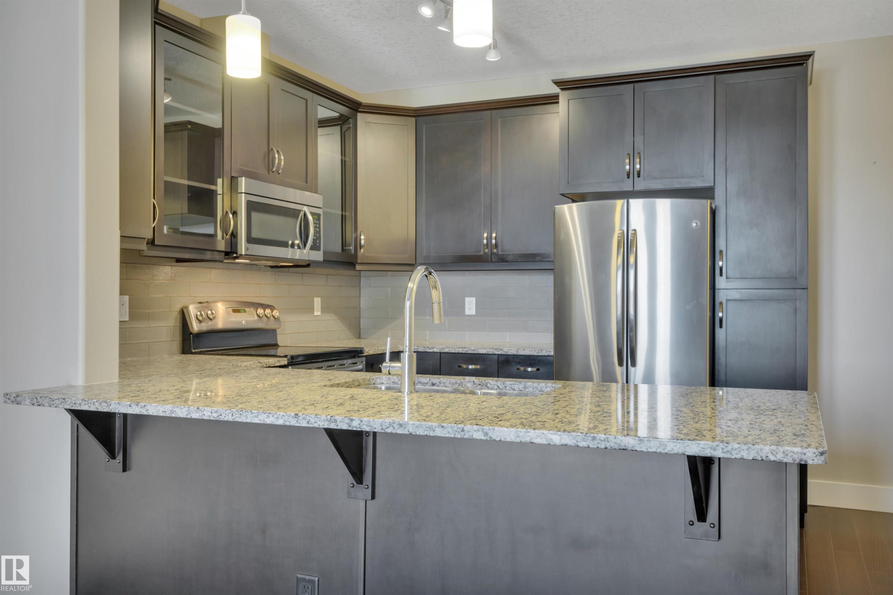 243 6079 Maynard Way, Edmonton, AB - Indoor Photo Showing Kitchen With Upgraded Kitchen