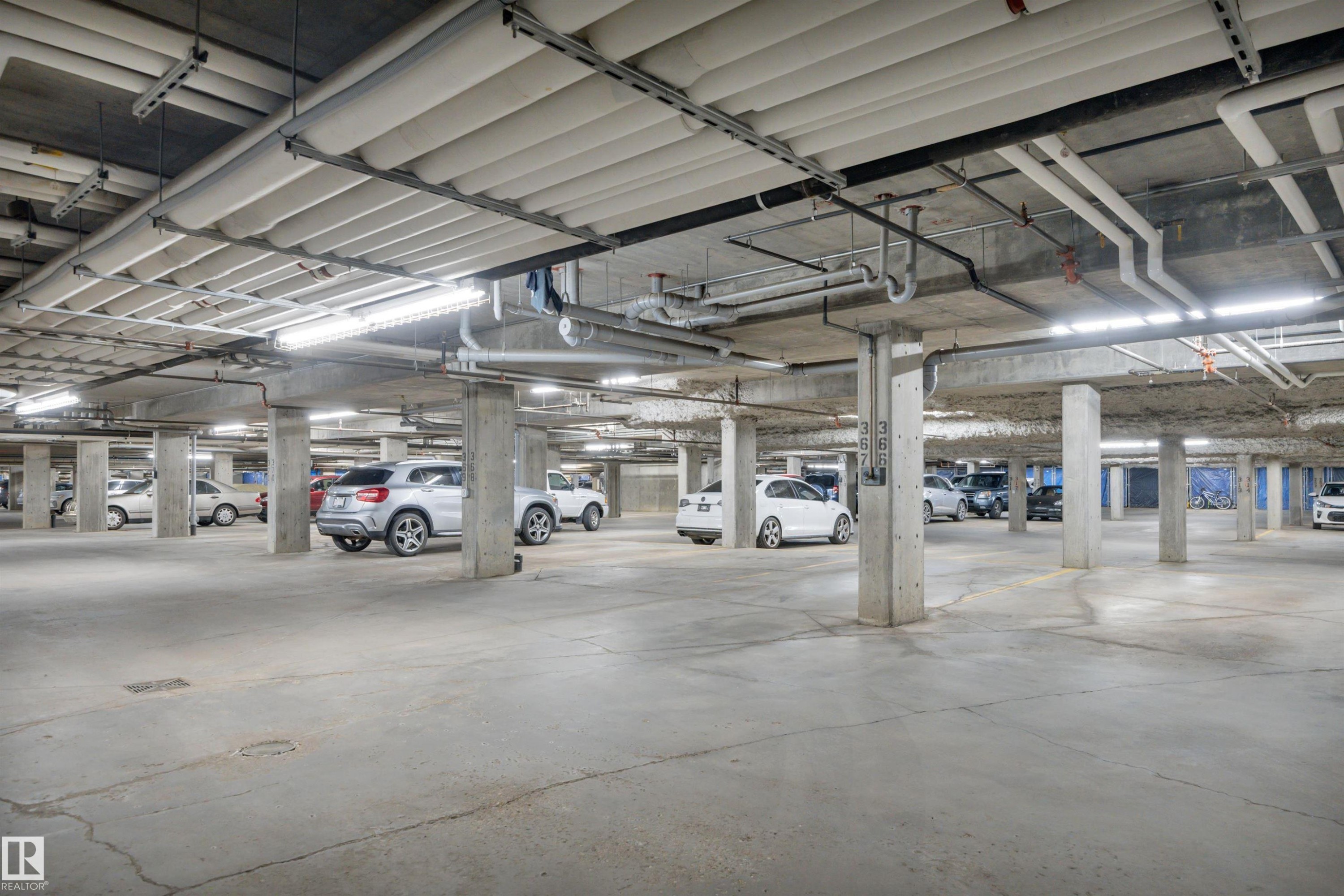 243 6079 Maynard Way, Edmonton, AB - Indoor Photo Showing Garage