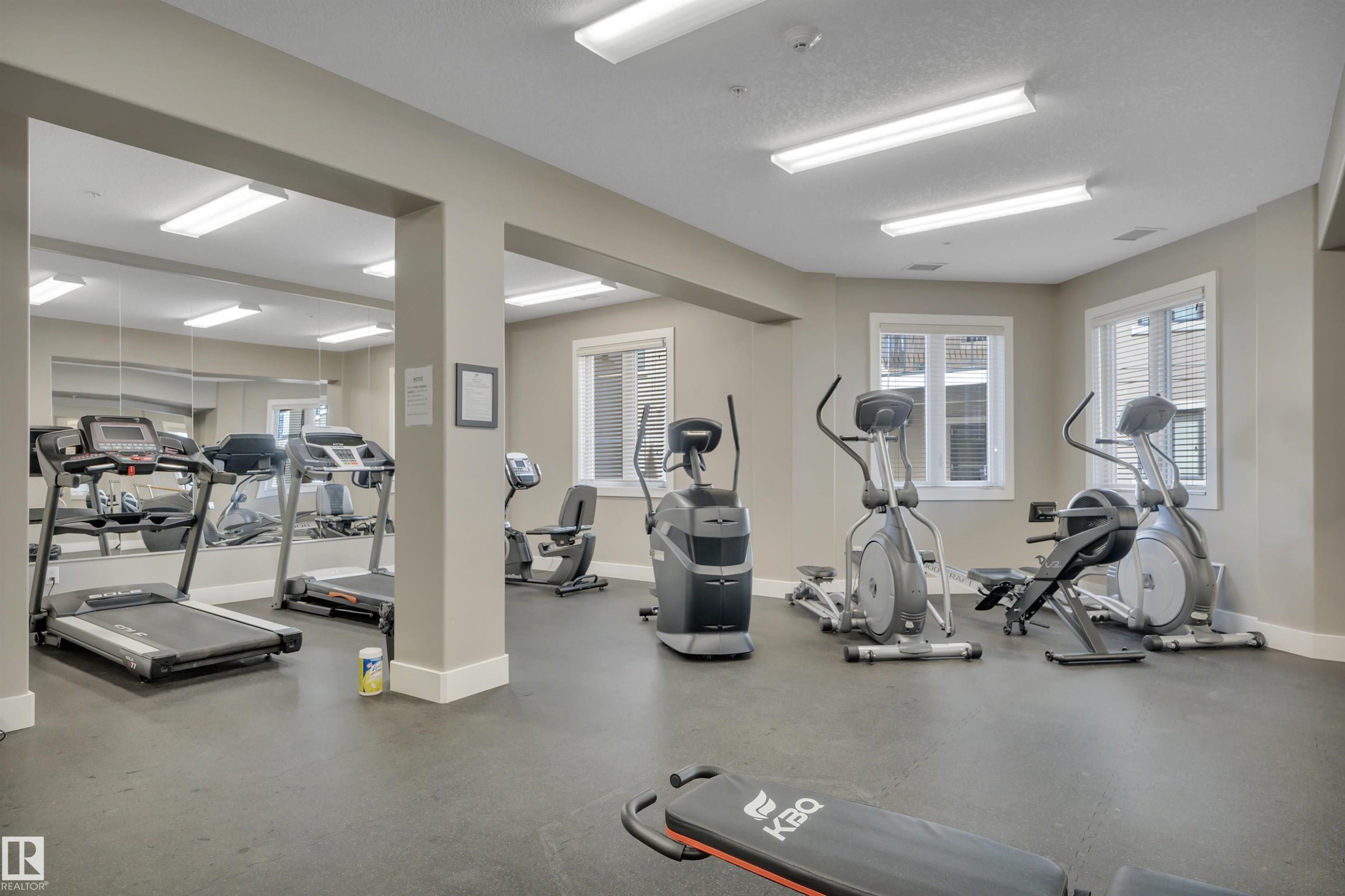 243 6079 Maynard Way, Edmonton, AB - Indoor Photo Showing Gym Room