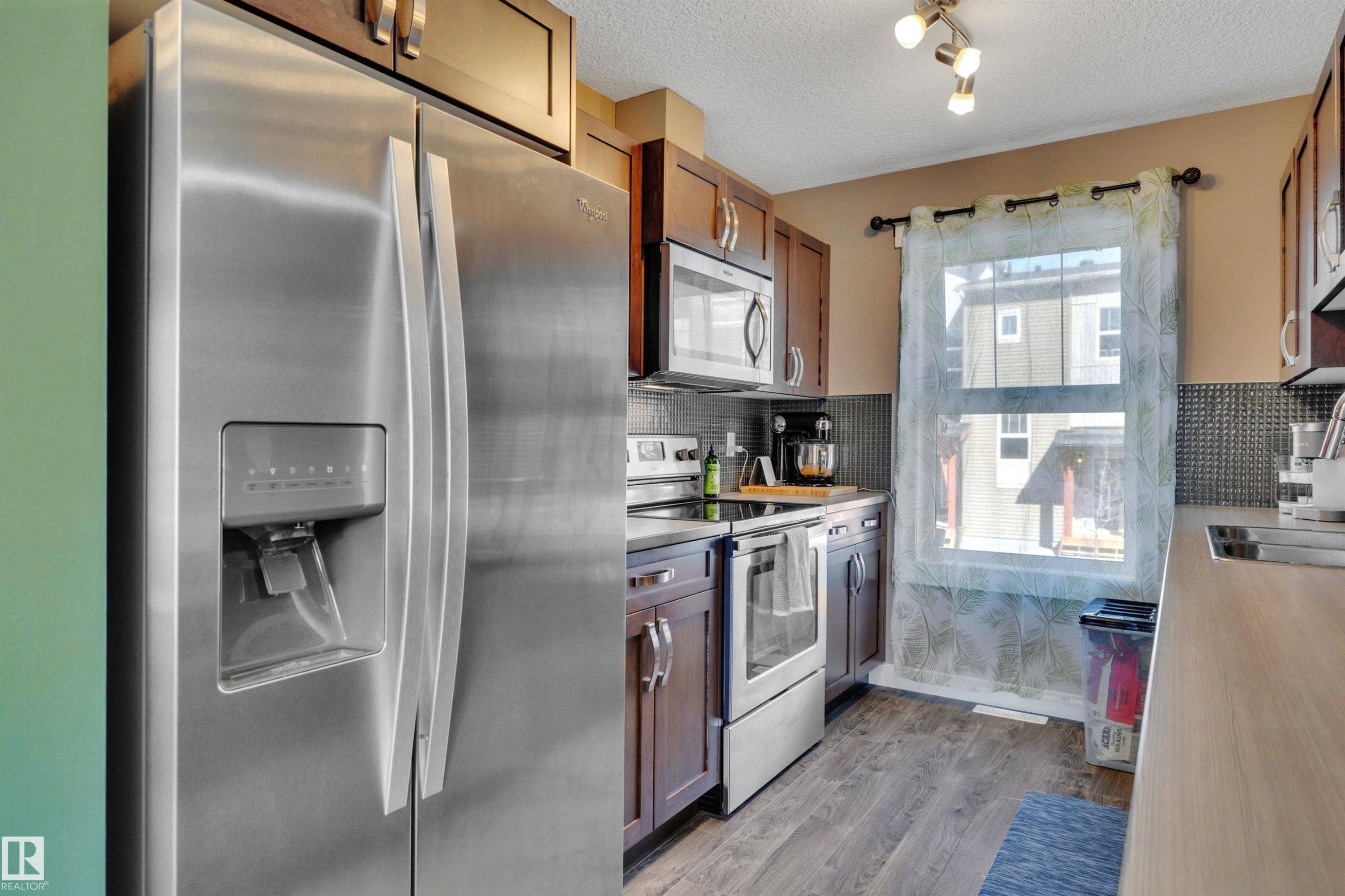 309 401 Southfork Drive, Leduc, AB - Indoor Photo Showing Kitchen
