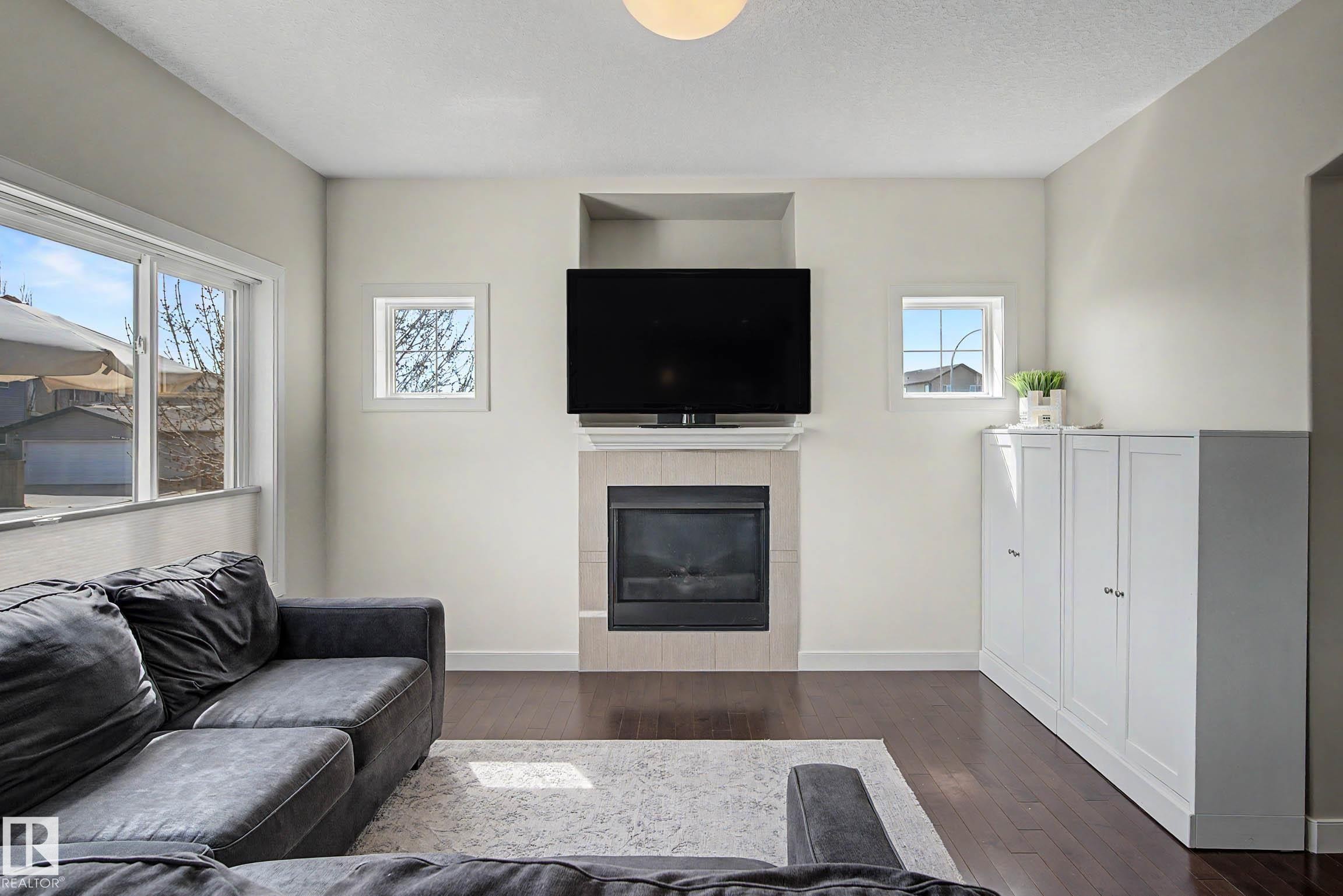 9483 227 Street, Edmonton, AB - Indoor Photo Showing Living Room With Fireplace