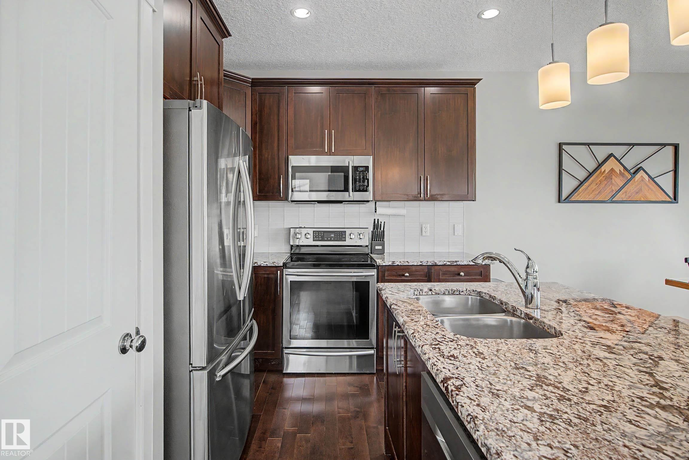 9483 227 Street, Edmonton, AB - Indoor Photo Showing Kitchen With Double Sink