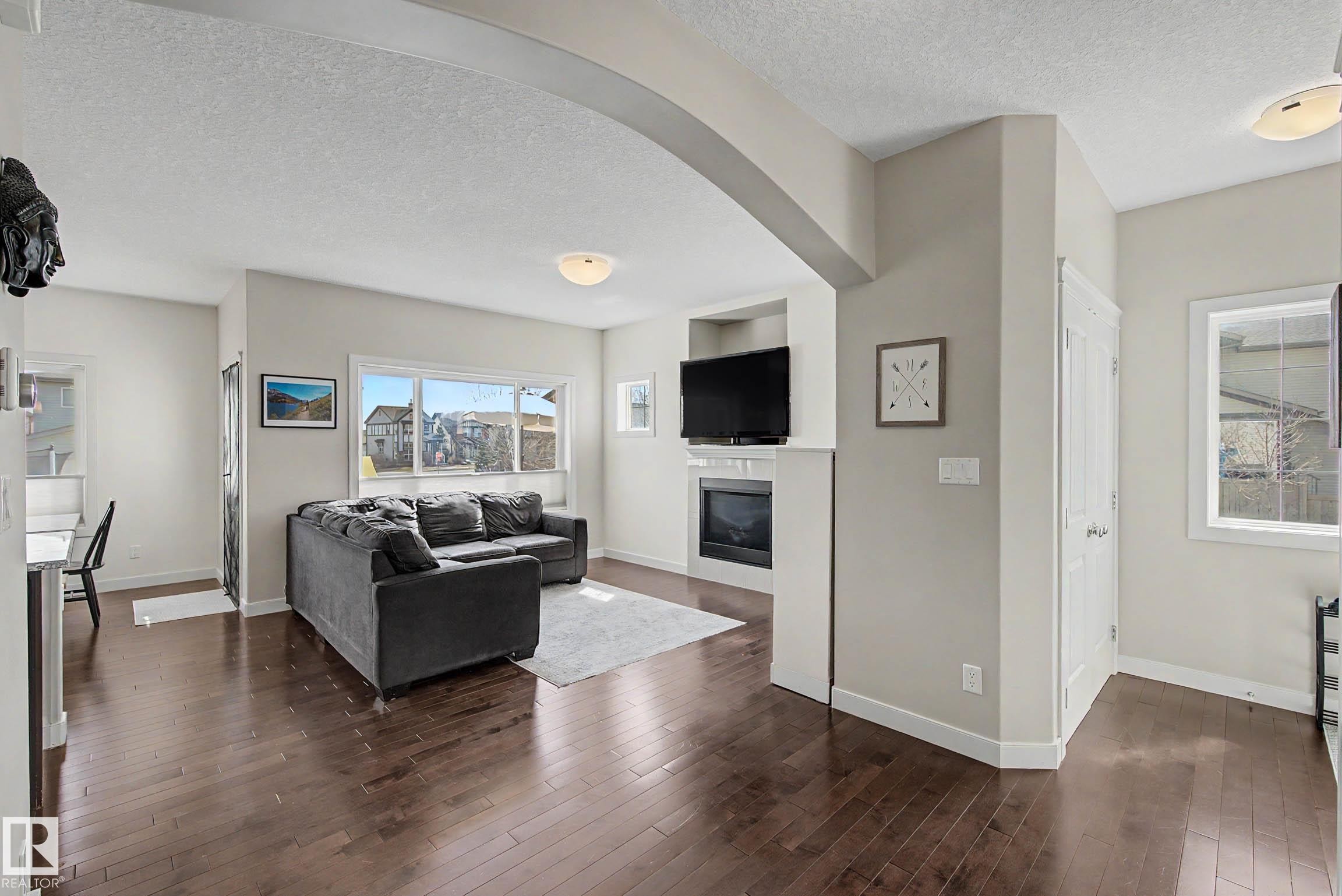 9483 227 Street, Edmonton, AB - Indoor Photo Showing Living Room With Fireplace