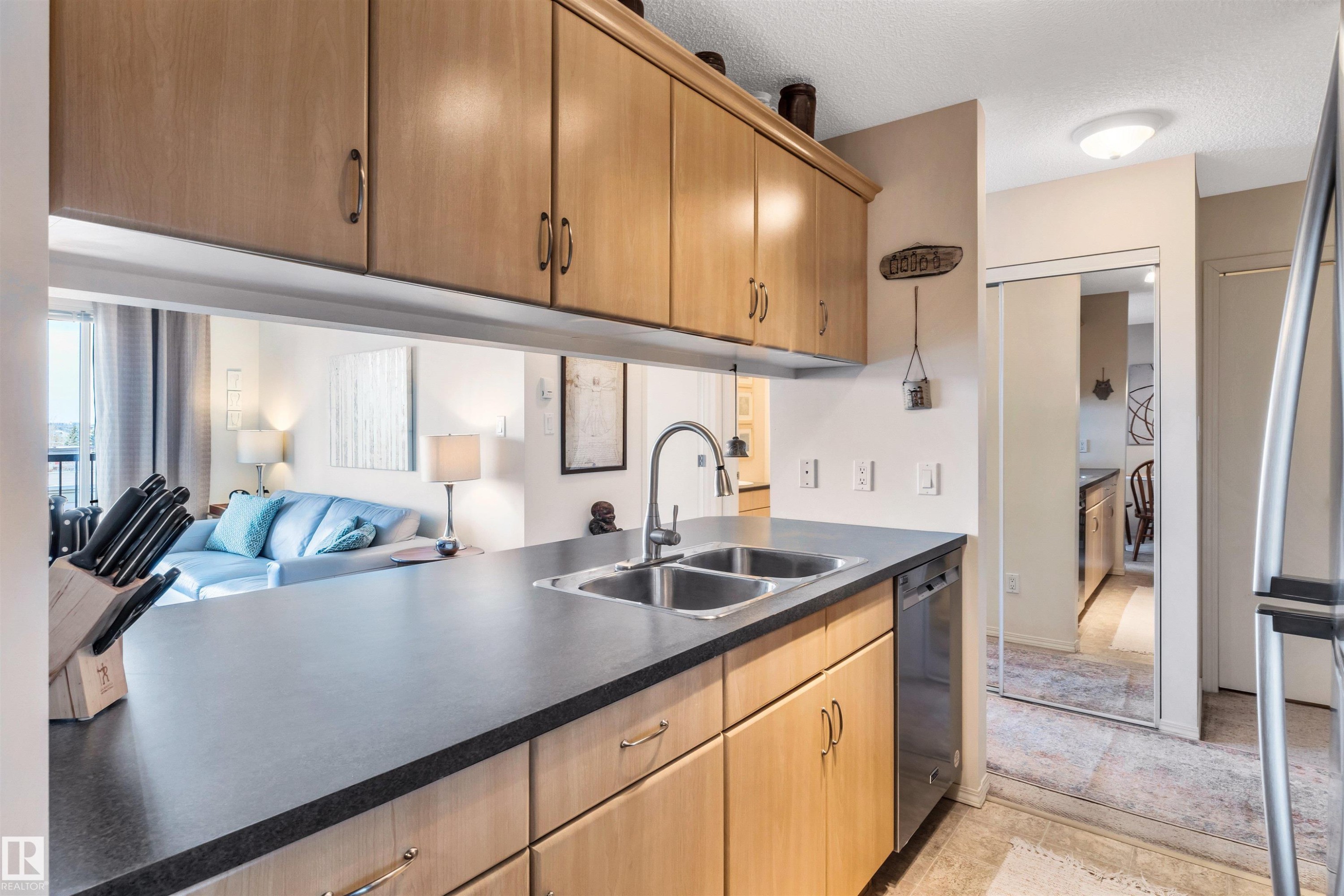 409 2430 Guardian Road, Edmonton, AB - Indoor Photo Showing Kitchen With Double Sink