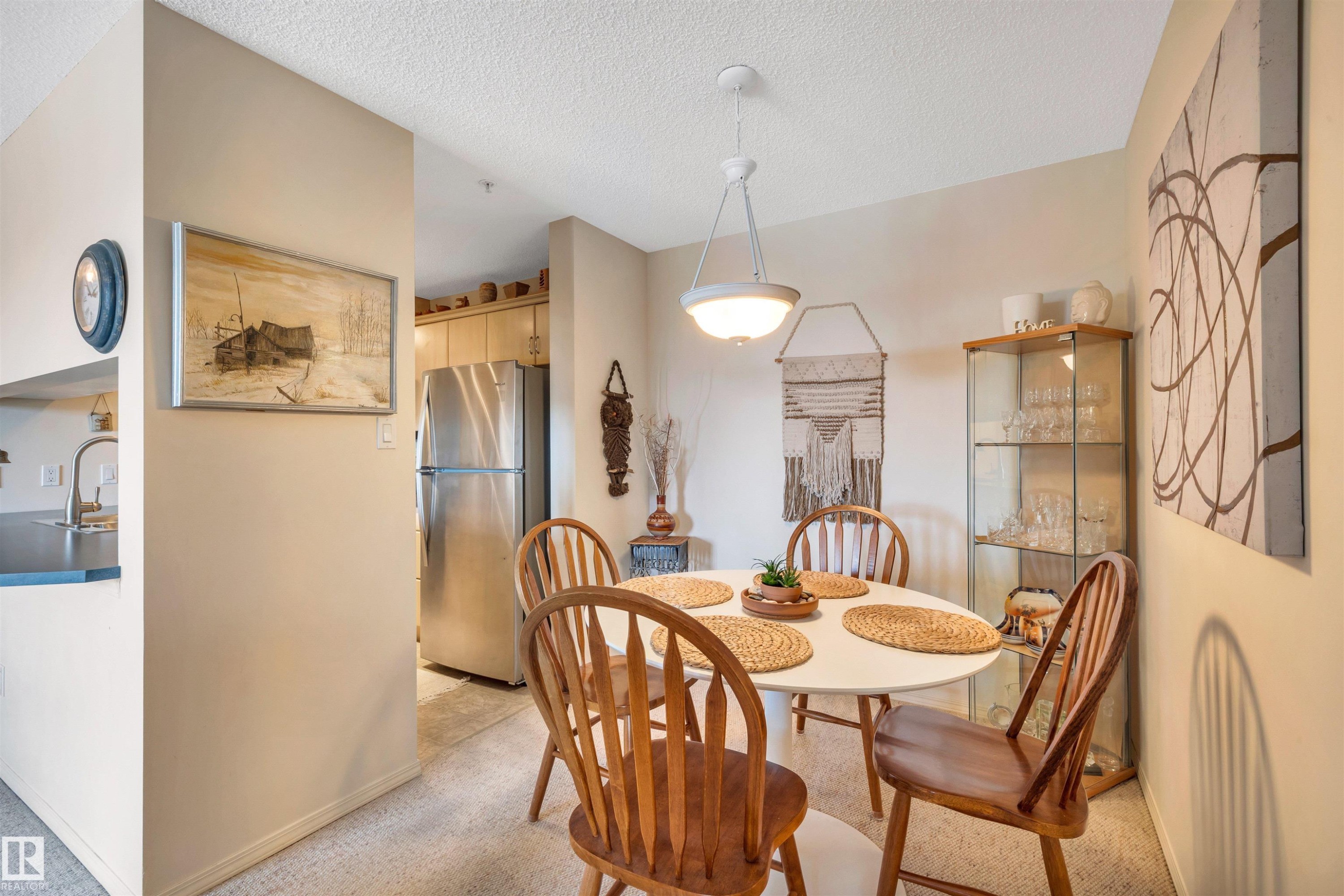 409 2430 Guardian Road, Edmonton, AB - Indoor Photo Showing Dining Room