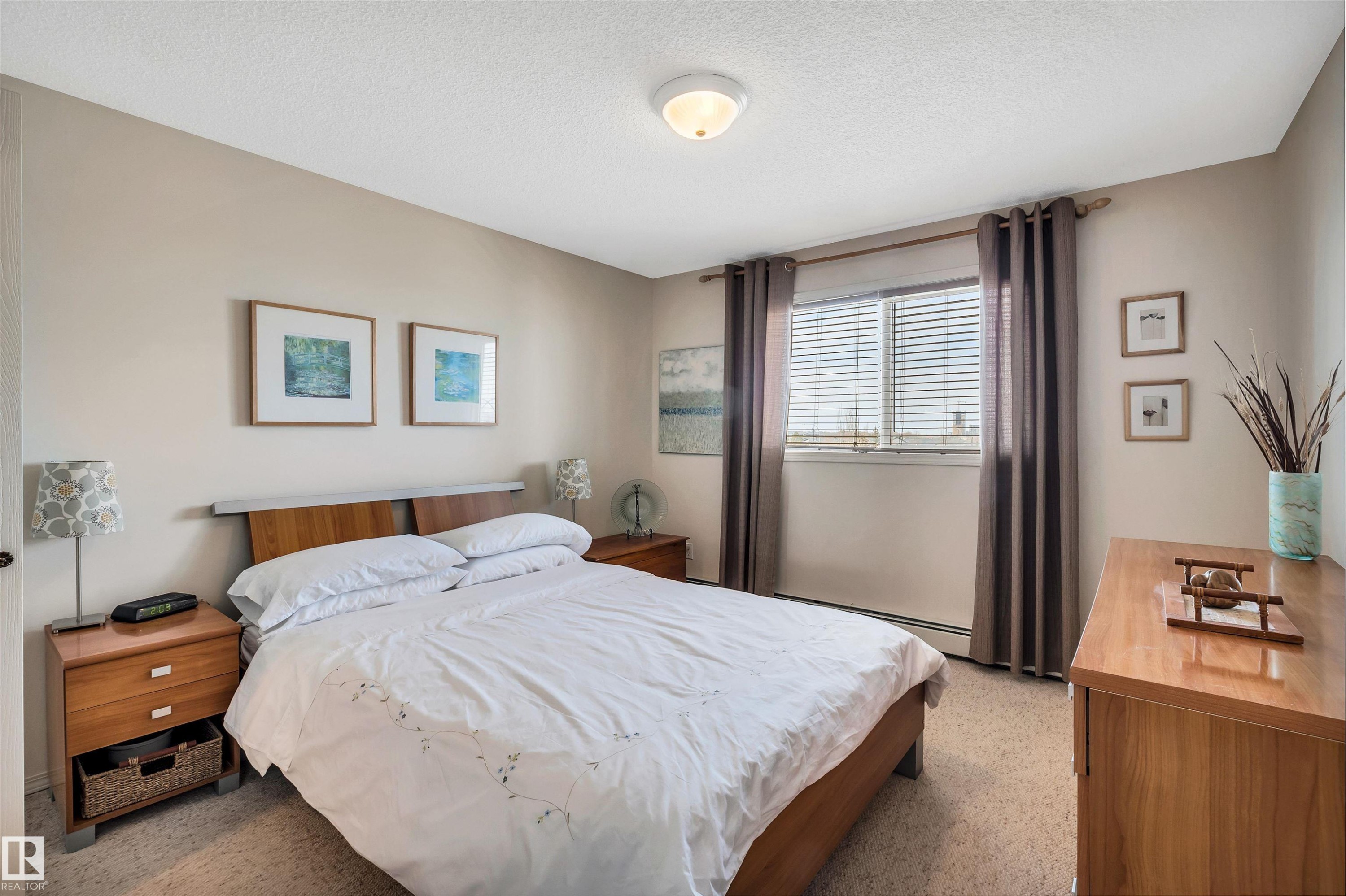 409 2430 Guardian Road, Edmonton, AB - Indoor Photo Showing Bedroom