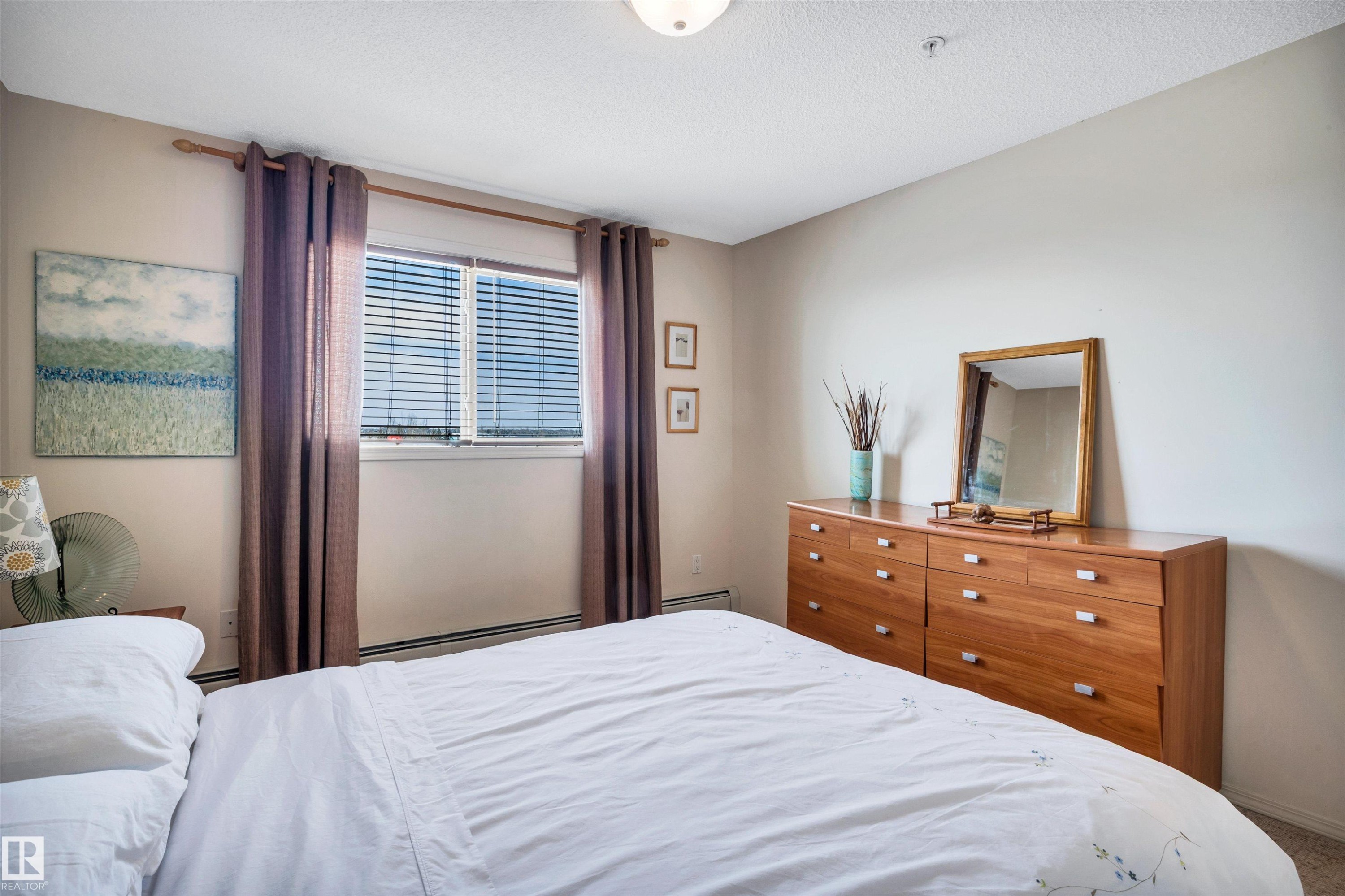 409 2430 Guardian Road, Edmonton, AB - Indoor Photo Showing Bedroom