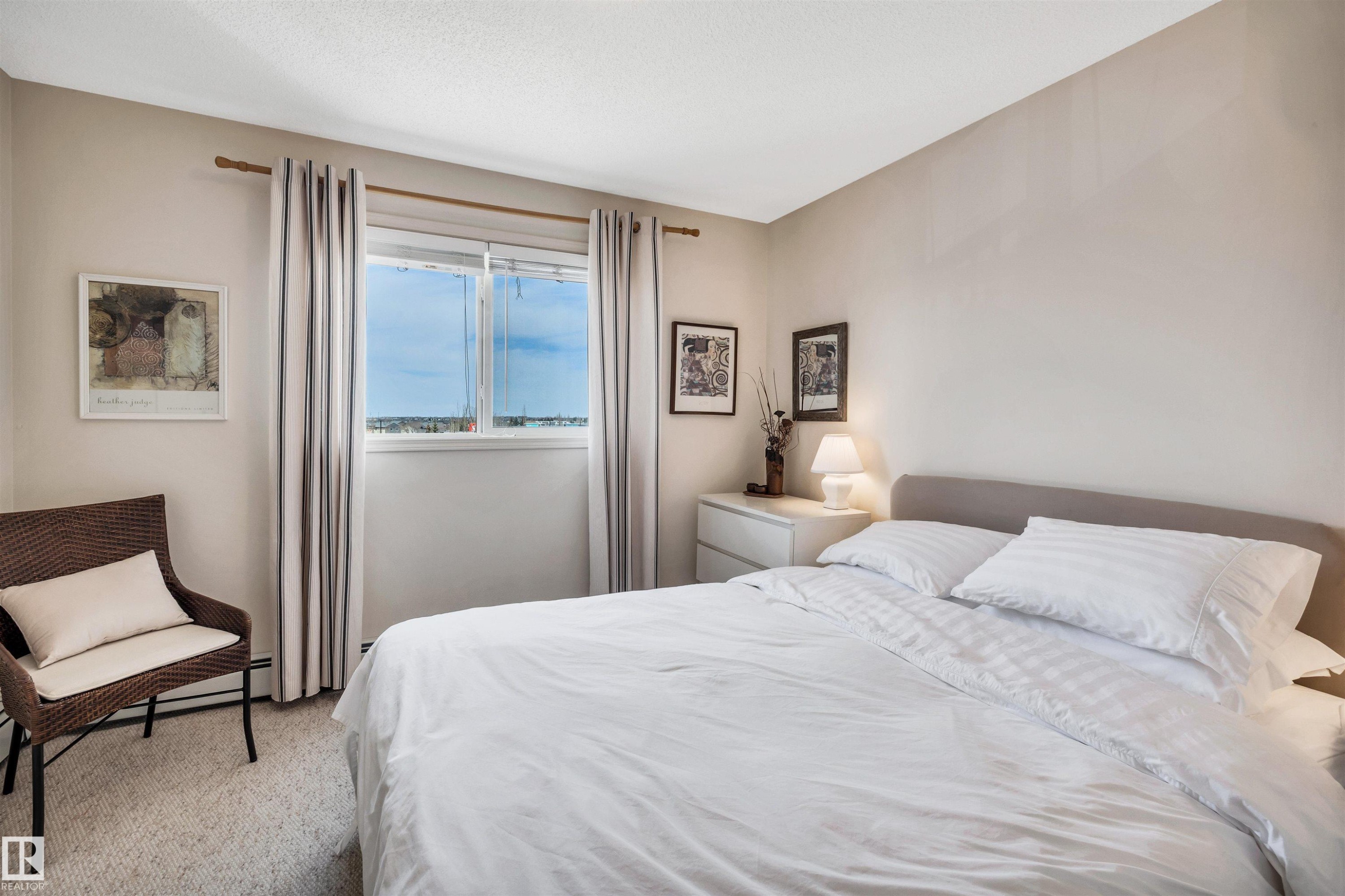 409 2430 Guardian Road, Edmonton, AB - Indoor Photo Showing Bedroom