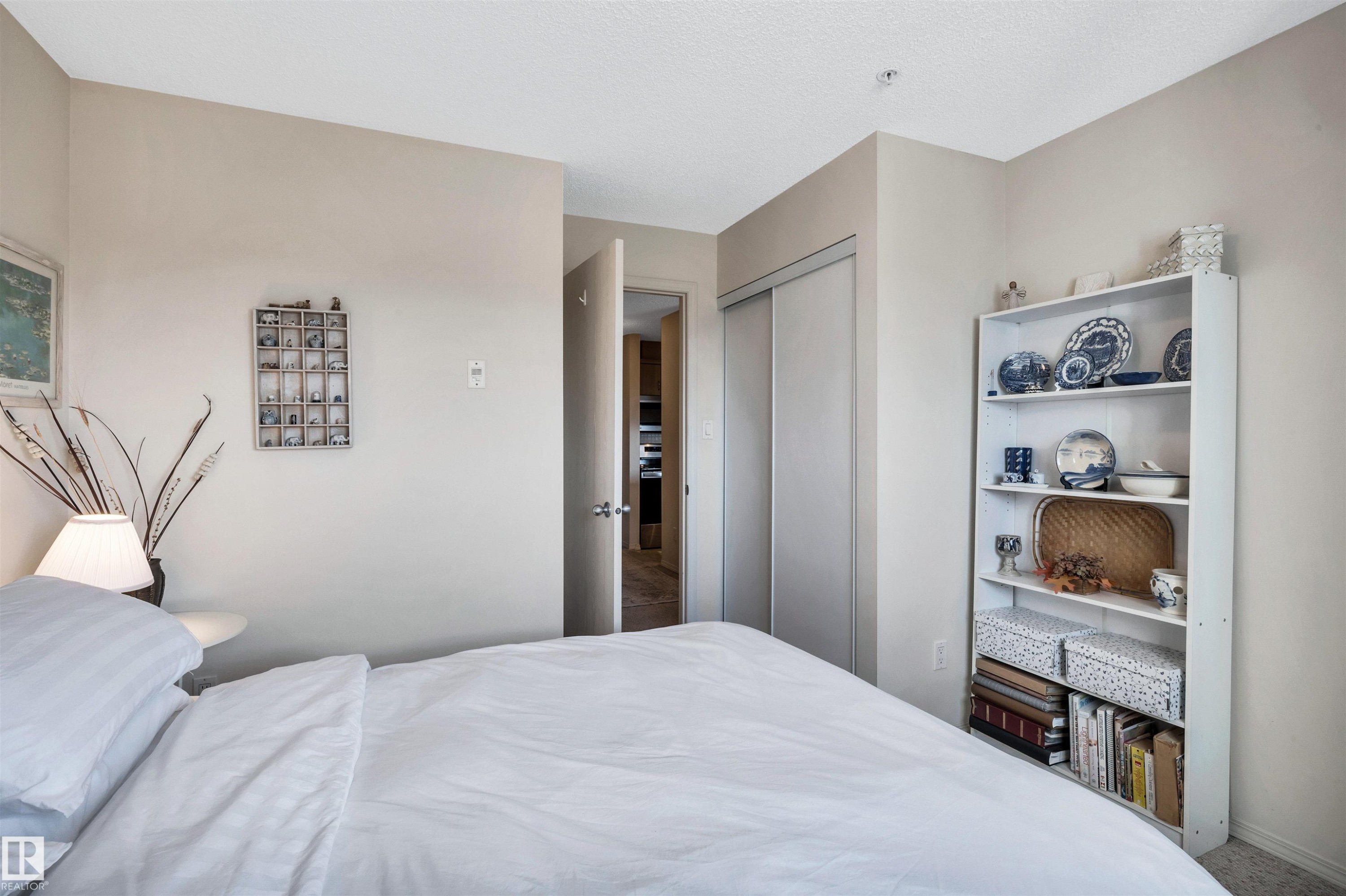 409 2430 Guardian Road, Edmonton, AB - Indoor Photo Showing Bedroom
