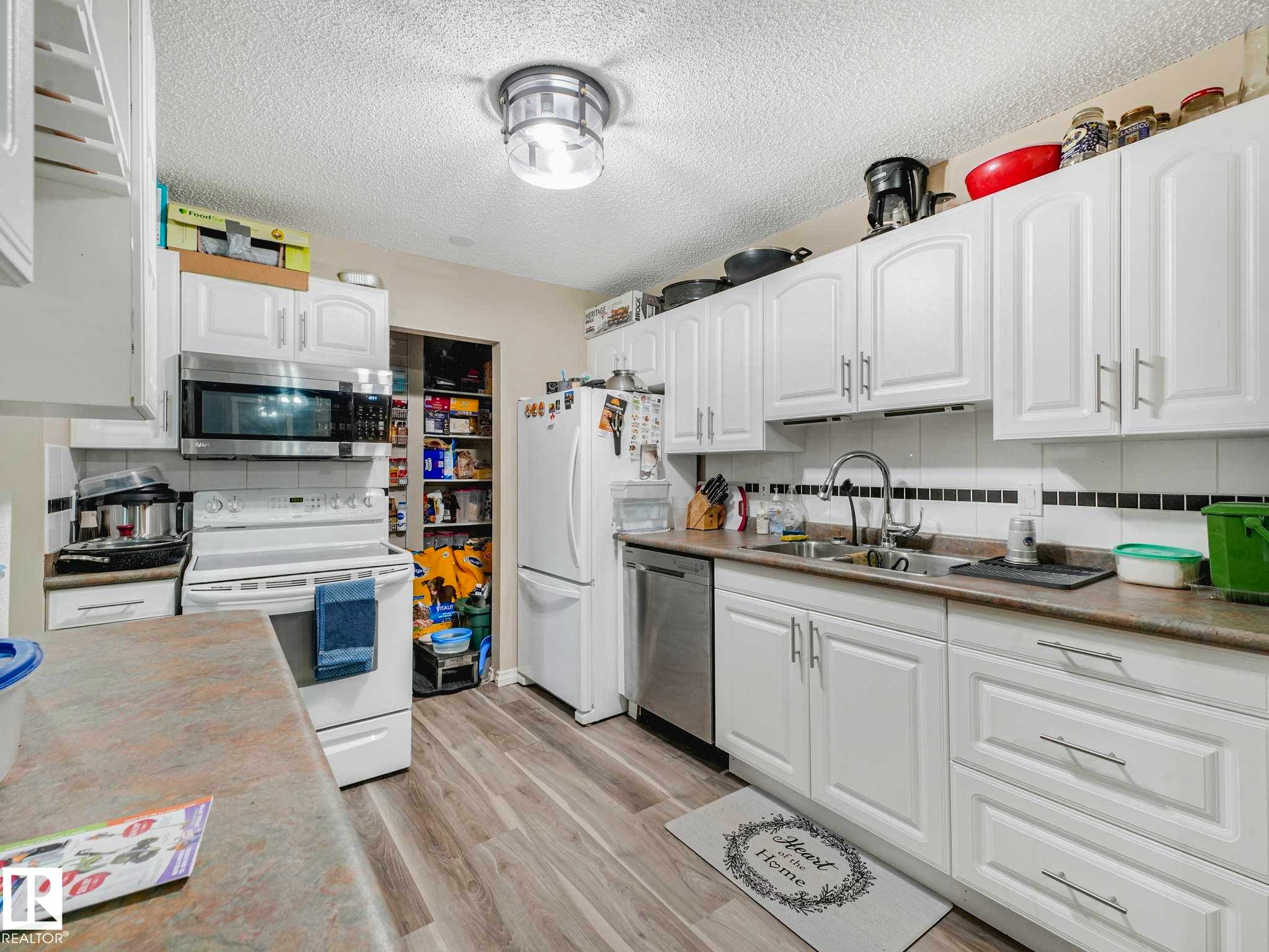 1102 Saddleback Road, Edmonton, AB - Indoor Photo Showing Kitchen With Double Sink