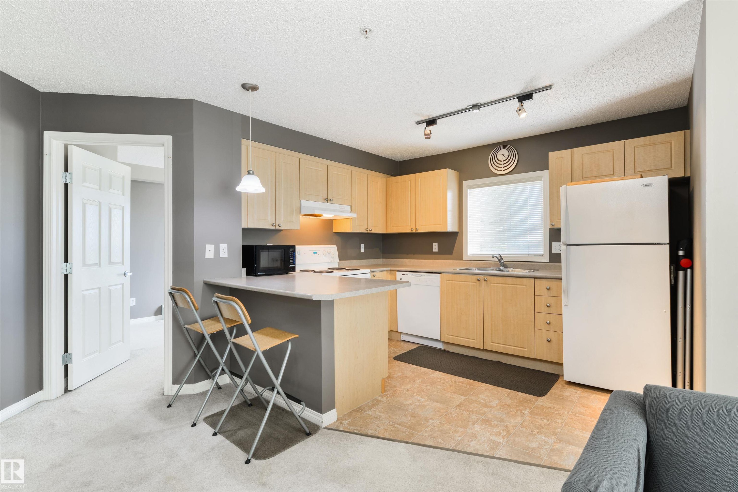 202 622 Mcallister Loop, Edmonton, AB - Indoor Photo Showing Kitchen With Double Sink