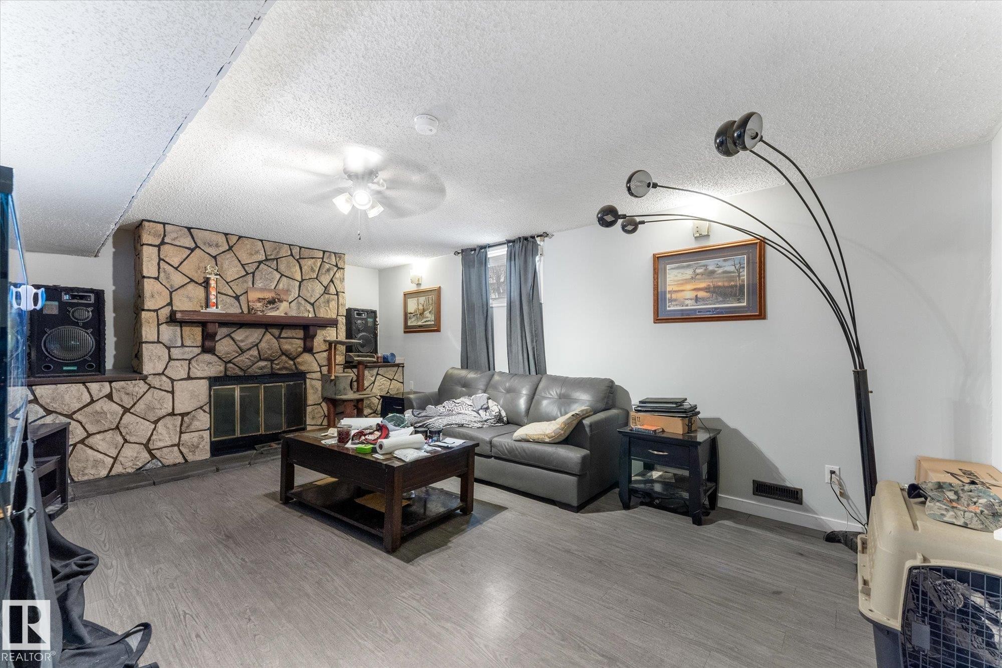 4520 54 Avenue, Leduc, AB - Indoor Photo Showing Living Room With Fireplace