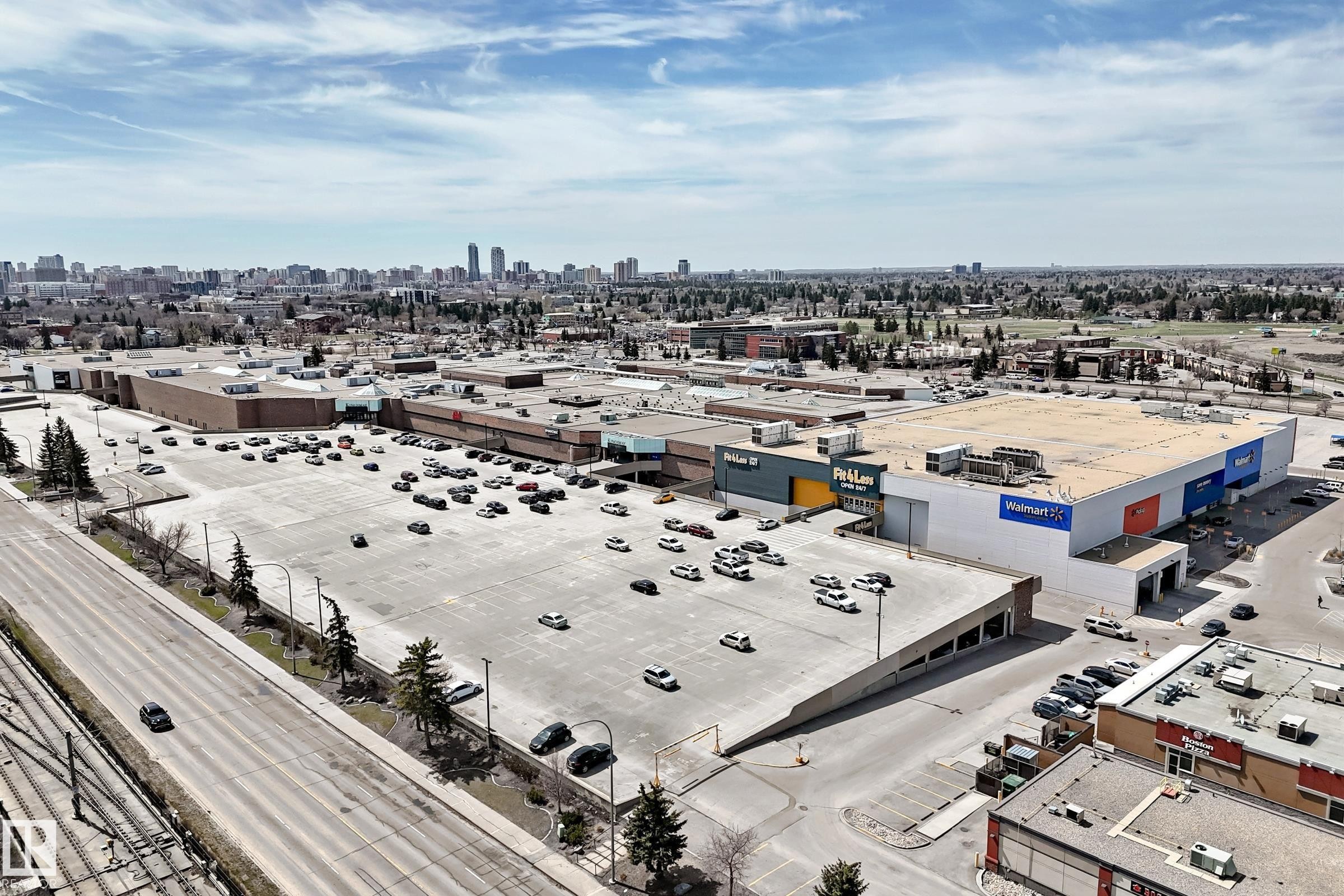 Large commercial retail center featuring multiple anchor stores and extensive surface parking - 10519 114 Avenue, Edmonton, AB - Outdoor With View