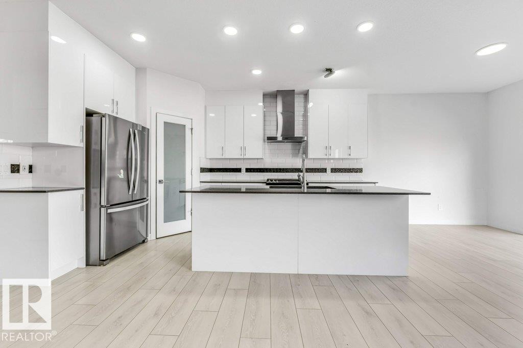 5140 23 Avenue, Edmonton, AB - Indoor Photo Showing Kitchen With Double Sink