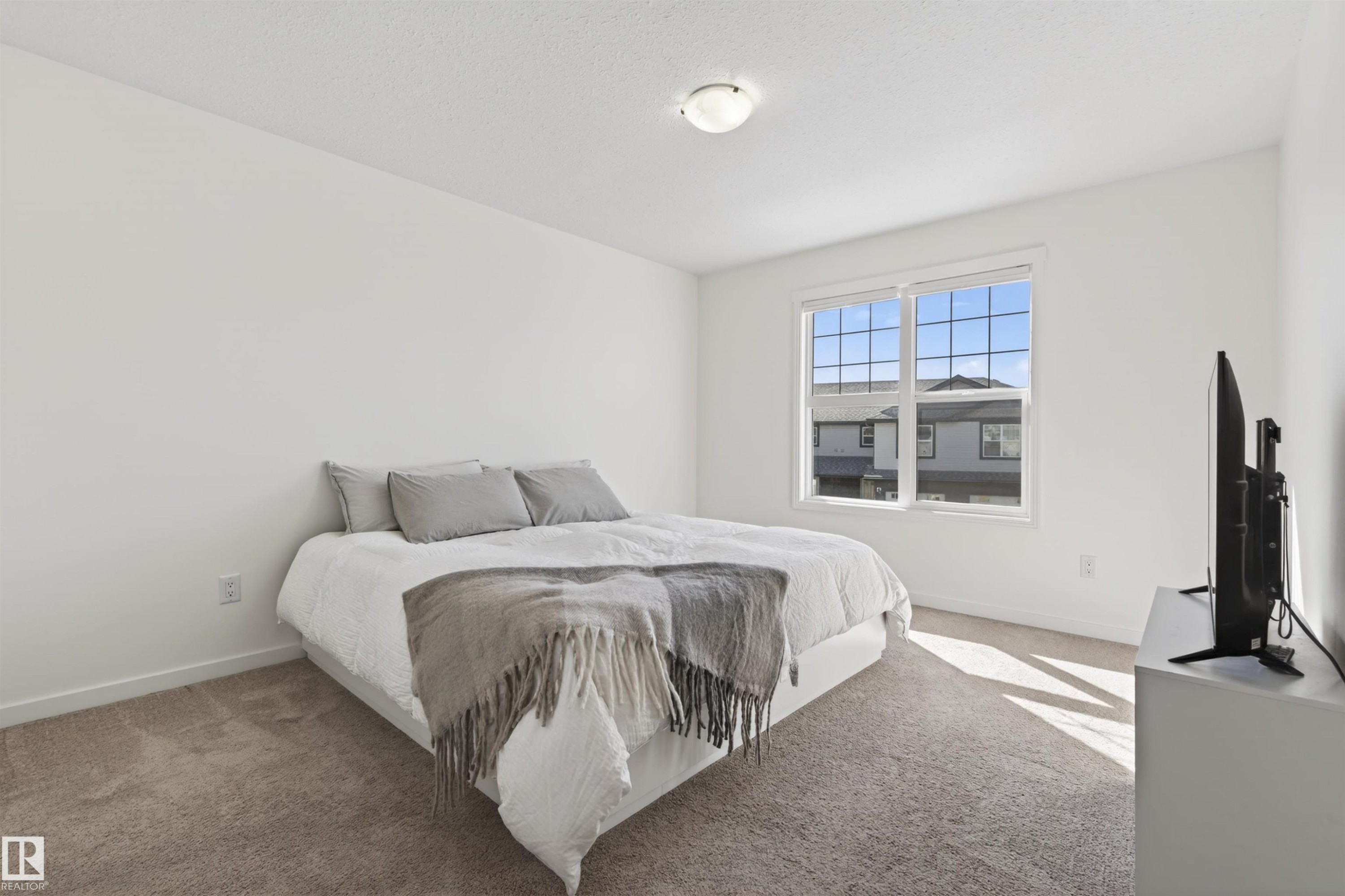 702C Rocky Way, Cold Lake, AB - Indoor Photo Showing Bedroom