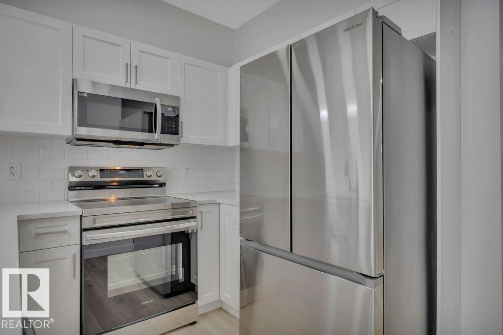46 603 Orchards Boulevard, Edmonton, AB - Indoor Photo Showing Kitchen With Stainless Steel Kitchen