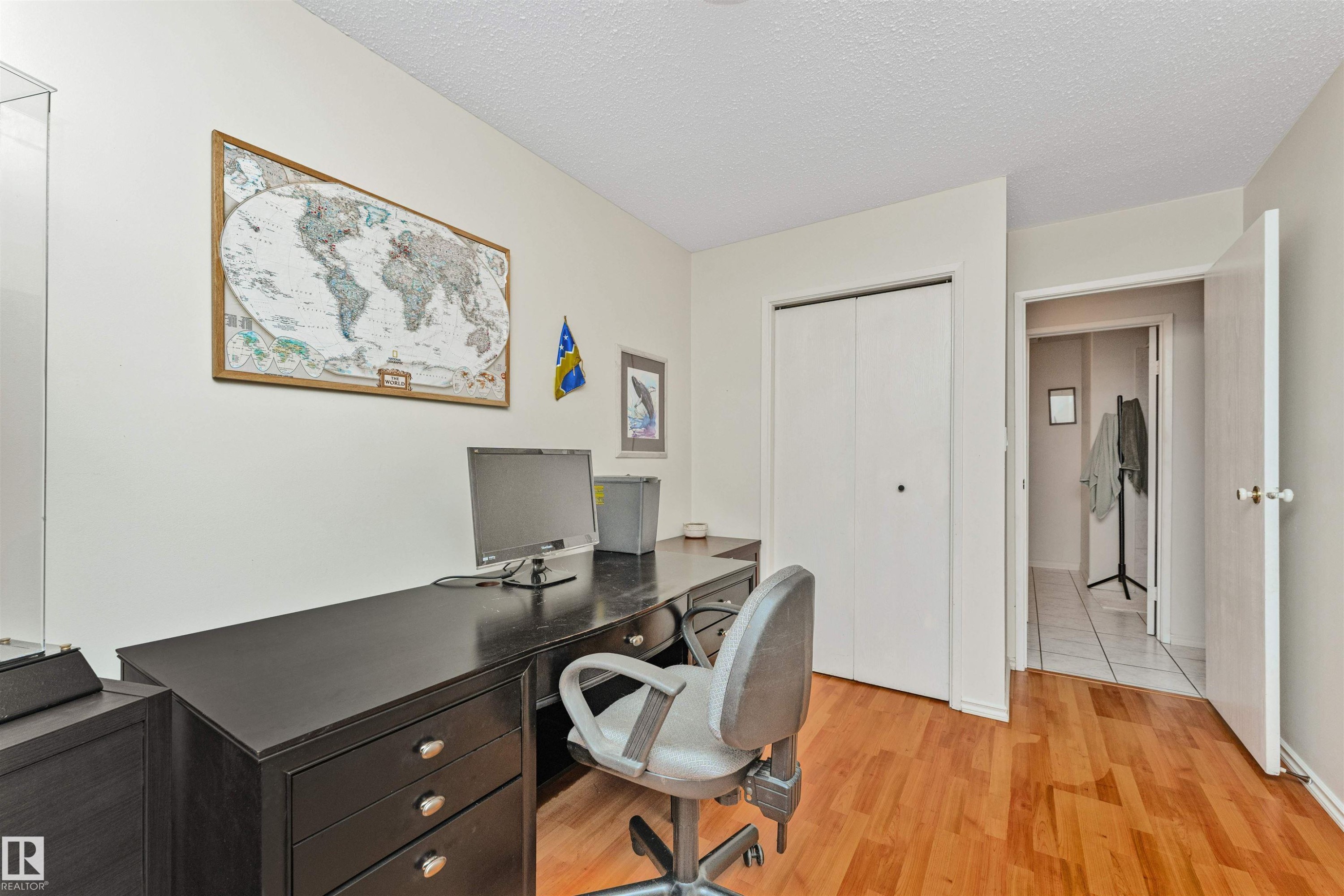 Room featuring wood-finish flooring and neutral wall tones - 49 Ash Crescent, St. Albert, AB - Indoor Photo Showing Office