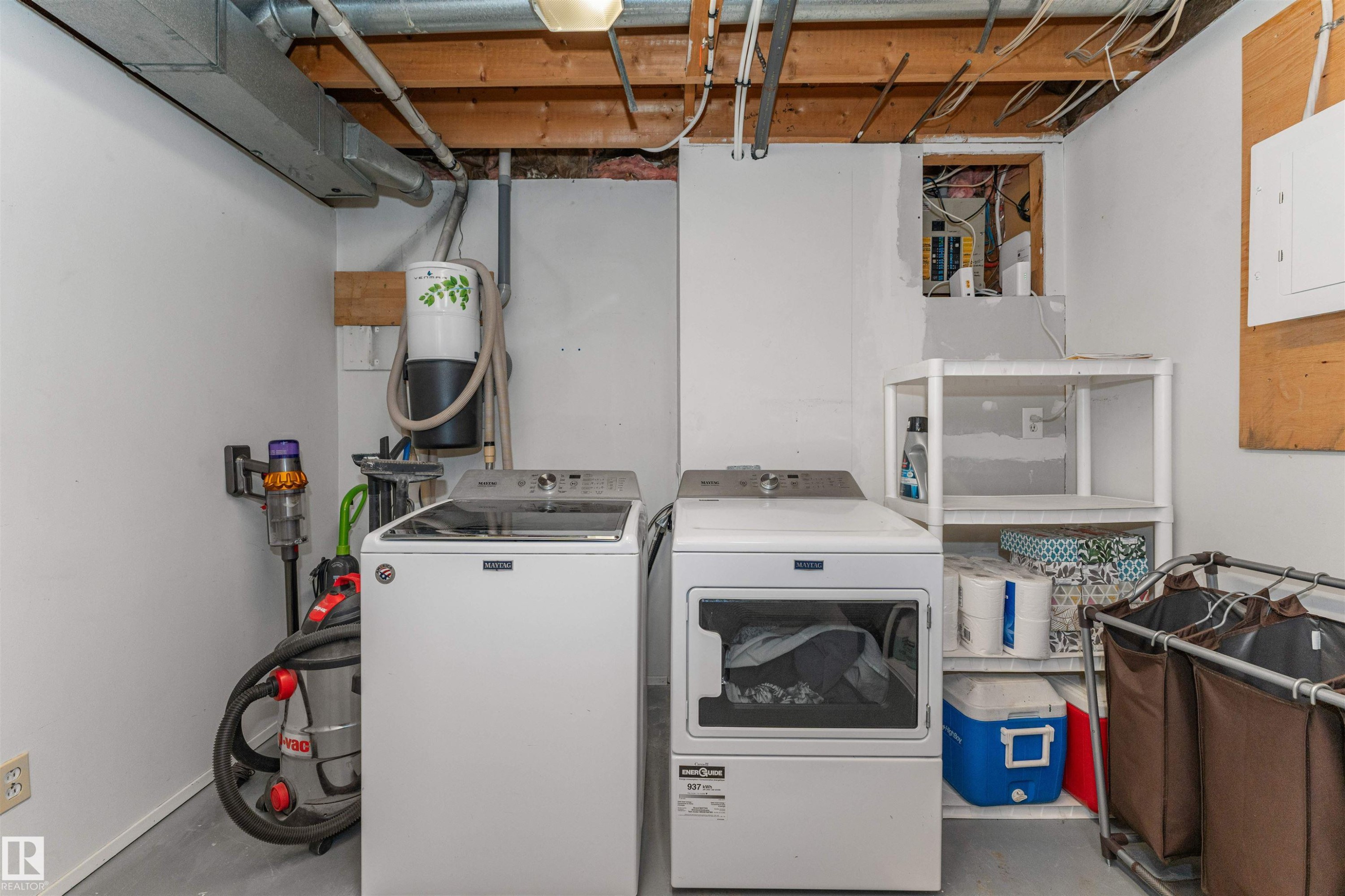 Utility space featuring an exposed ceiling, light gray flooring, and white painted walls - 49 Ash Crescent, St. Albert, AB - Indoor Photo Showing Laundry Room