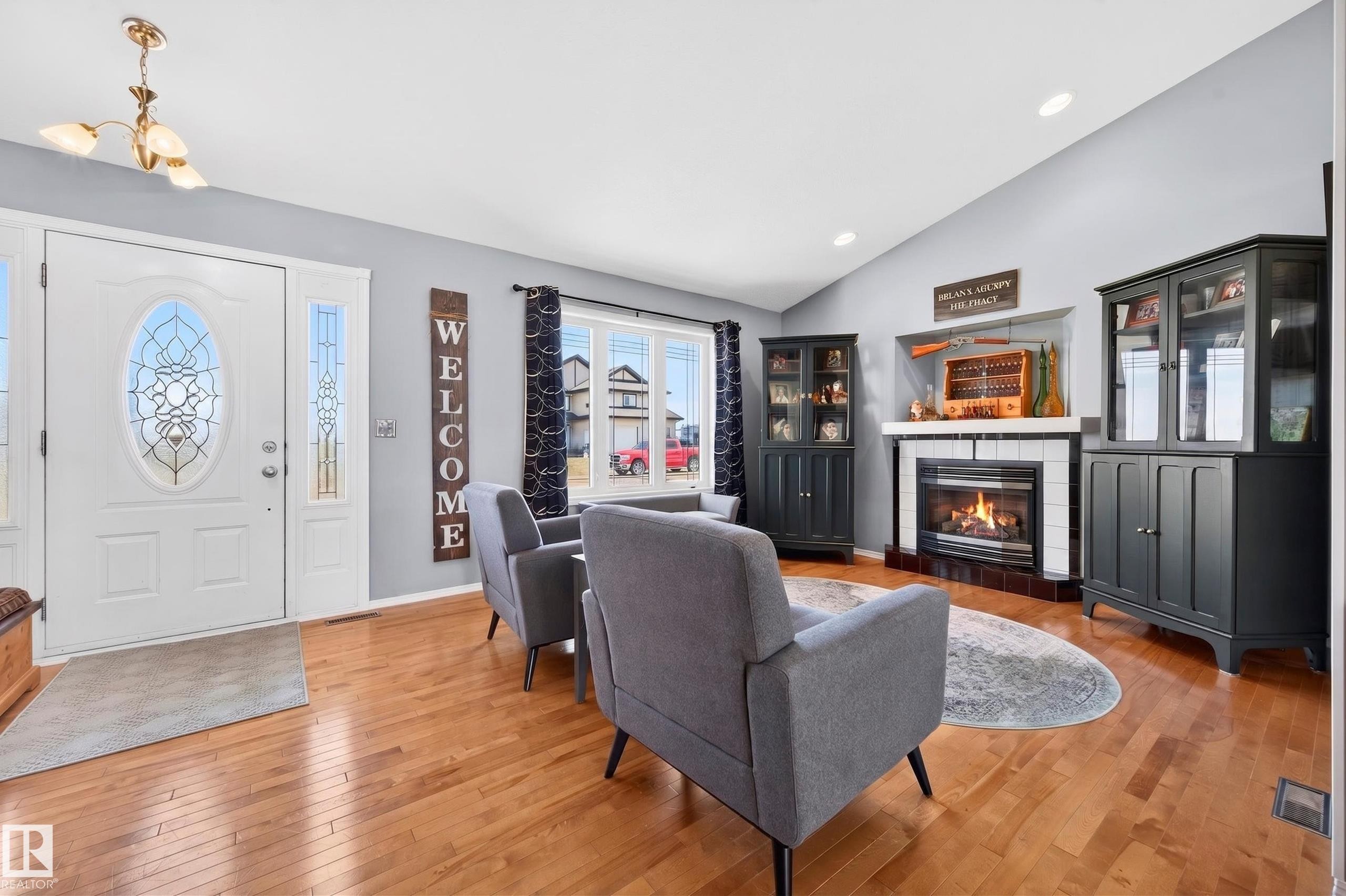 4217 55 Avenue, Lamont, AB - Indoor Photo Showing Living Room With Fireplace