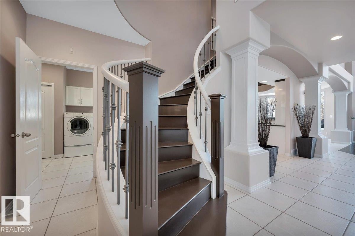 STAIRS LEADING TO THE UPPER LOFT AREA AND PRIMARY BEDROOM AND ENSUITE - 314 Weaver Point(E), Edmonton, AB - Indoor