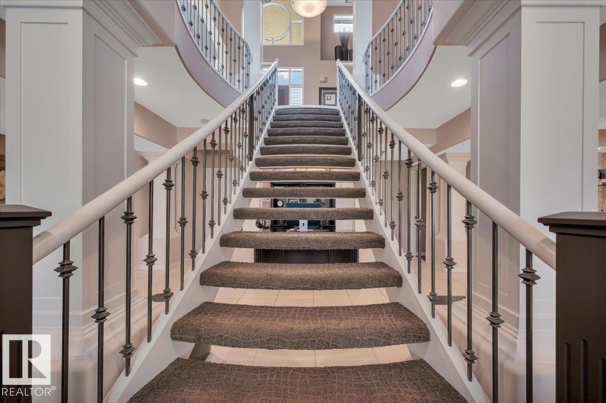 SPECTACULAR STAIRCASE FROM THE MAIN TO LOWER LEVEL - 314 Weaver Point(E), Edmonton, AB - Indoor Photo Showing Other Room
