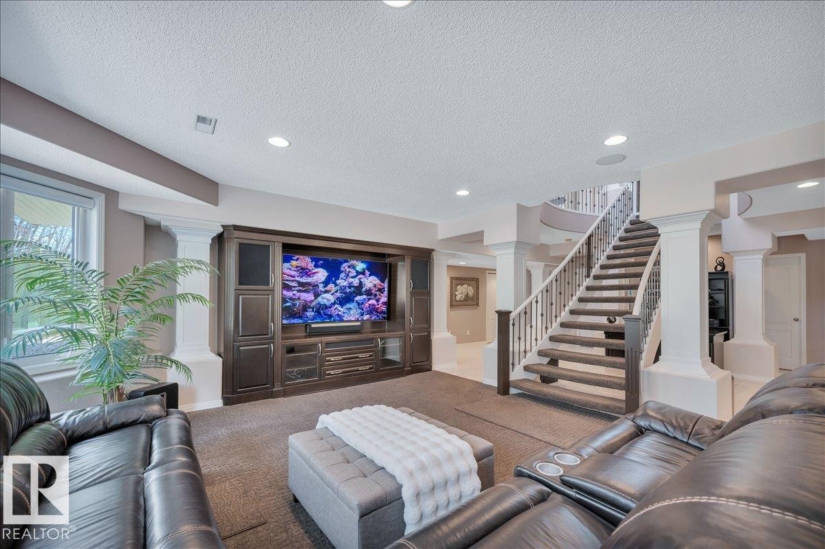 LOWER LEVEL FAMILY ROOM. HEATED FLOORS FOR MOST OF THE LOWER LEVEL - 314 Weaver Point(E), Edmonton, AB - Indoor Photo Showing Living Room
