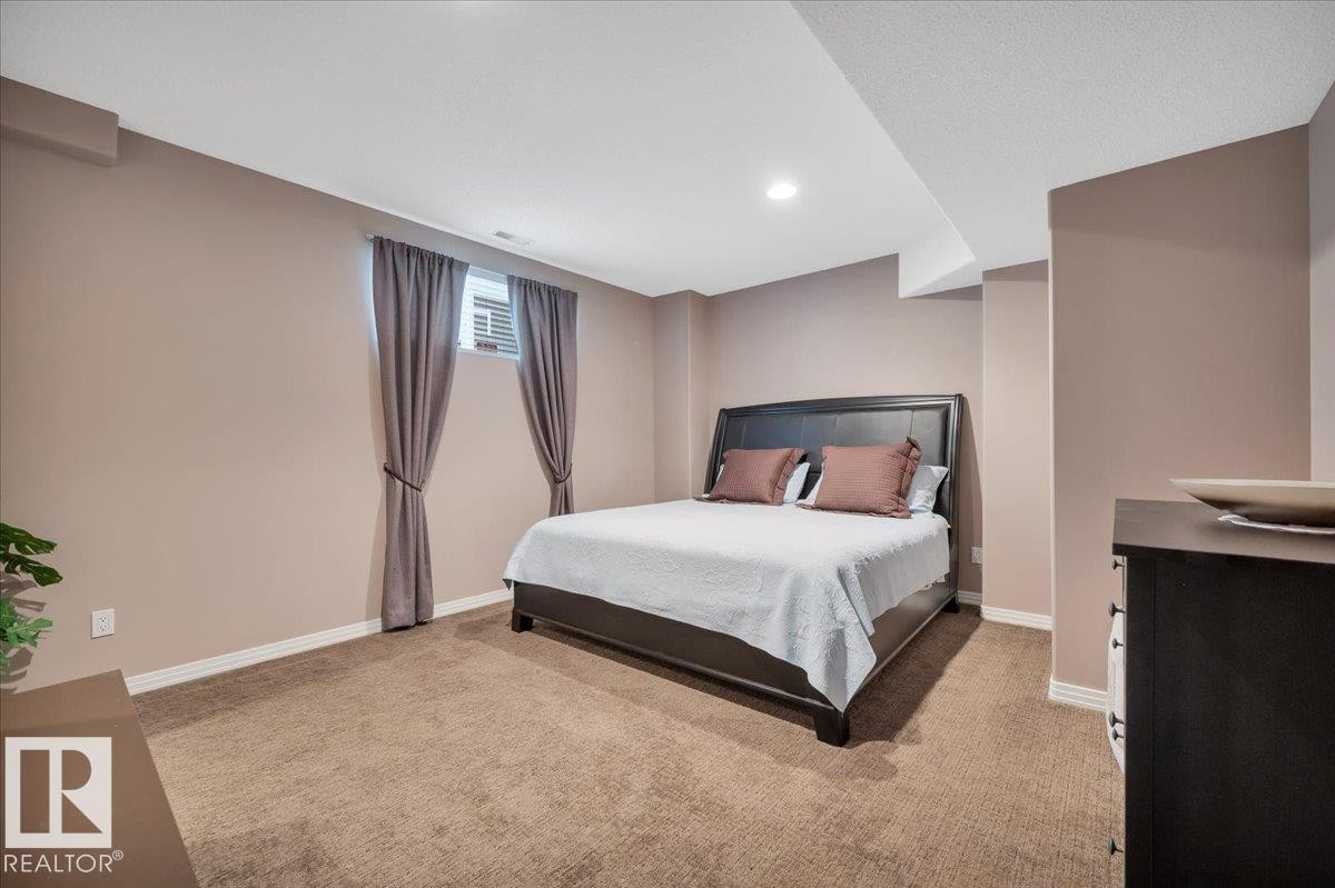 FIRST OF 2 LOWER LEVEL BEDROOMS - 314 Weaver Point(E), Edmonton, AB - Indoor Photo Showing Bedroom