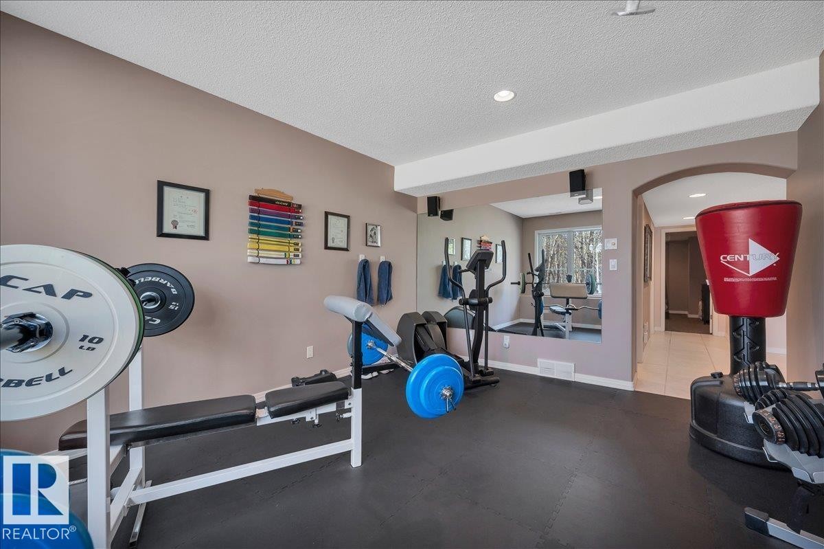 WITH MIRRORED WALL - 314 Weaver Point(E), Edmonton, AB - Indoor Photo Showing Gym Room