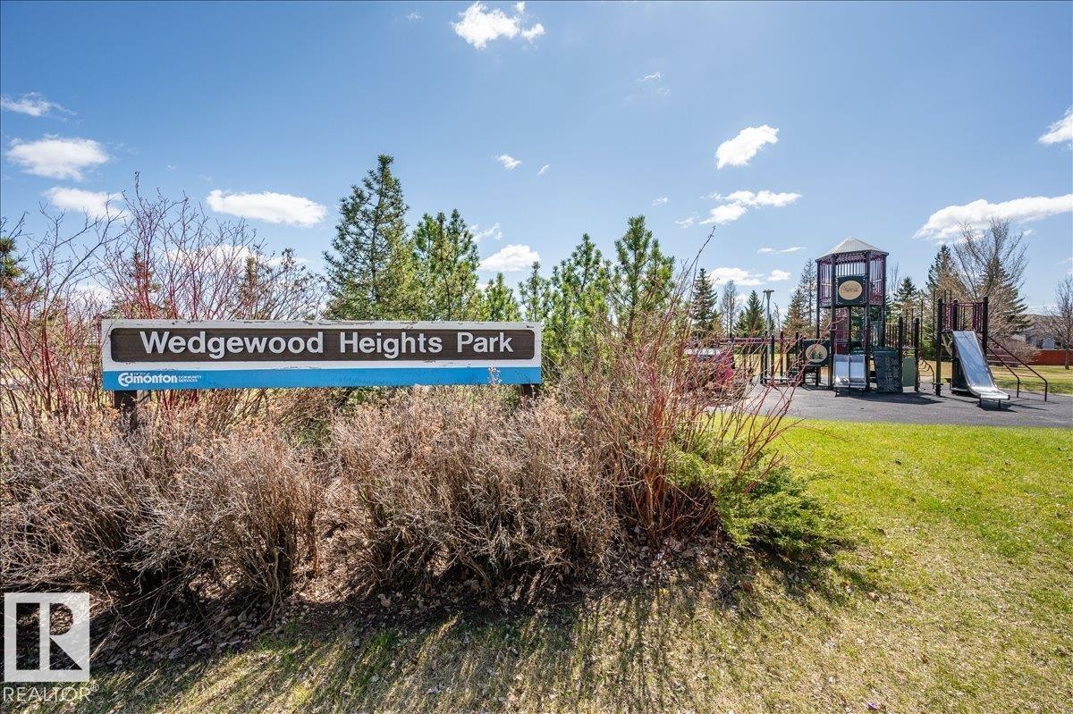 WEDGEWOOD HEIGHTS PARK WITH PLAYGROUND, TENNIS COURTS, BASKETBALL, SPORTS FIELD AND WALKING PATHS THROUGHOUT THE AREA AND RAVINE - 314 Weaver Point(E), Edmonton, AB - Outdoor With View