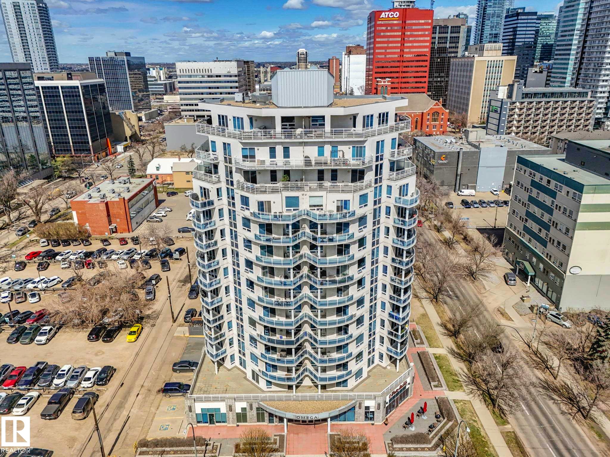High-rise residential building featuring multiple levels of curved balconies - 305 10504 99 Avenue, Edmonton, AB - Outdoor With Facade