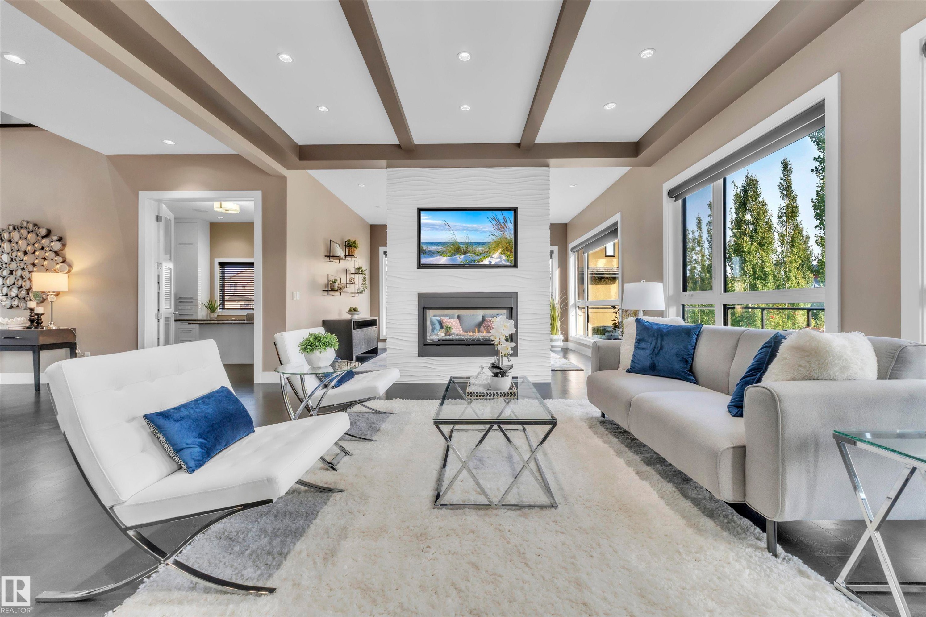 4727 Woolsey Common, Edmonton, AB - Indoor Photo Showing Living Room With Fireplace