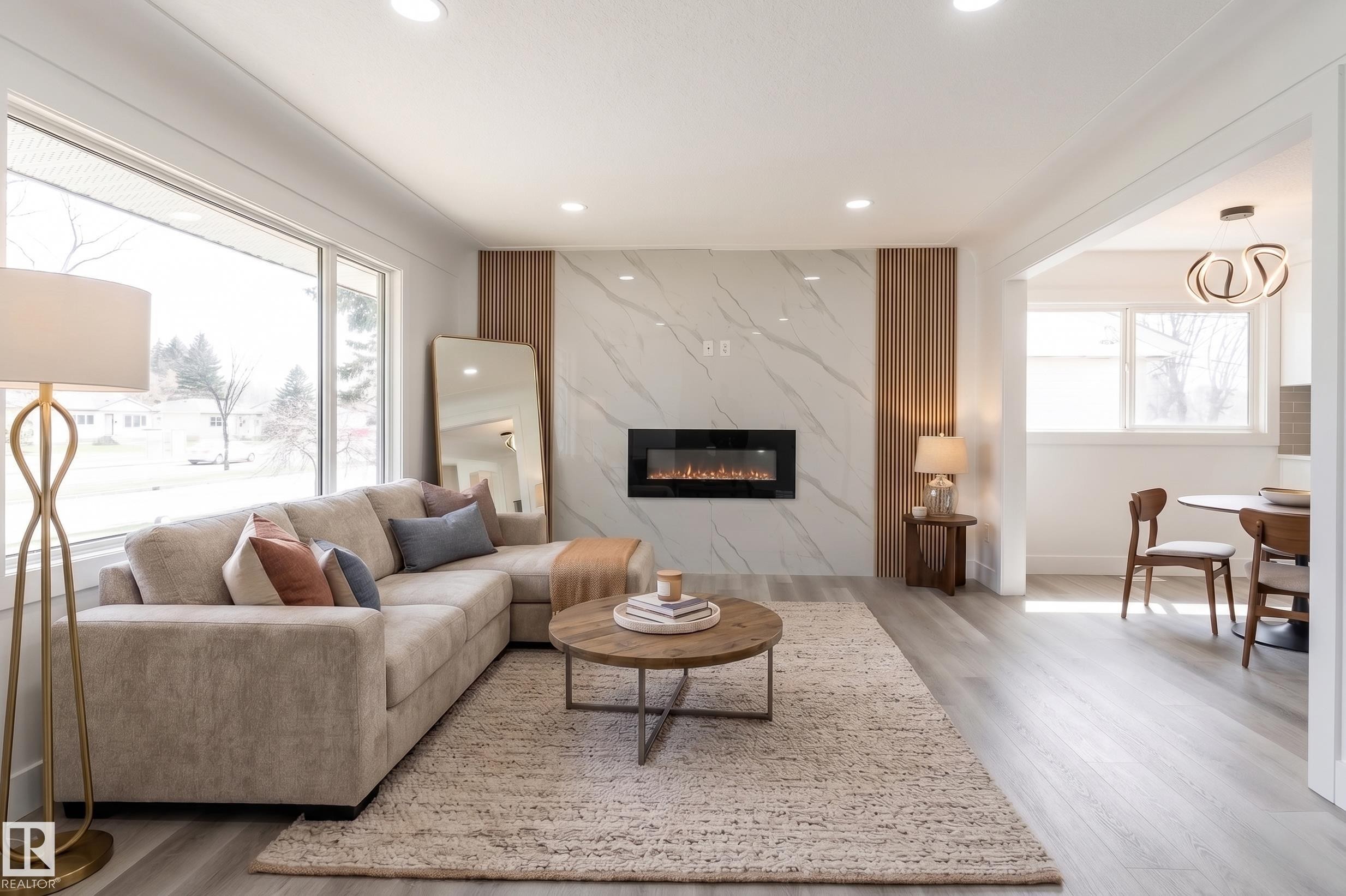 11844 St Albert Trail, Edmonton, AB - Indoor Photo Showing Living Room With Fireplace