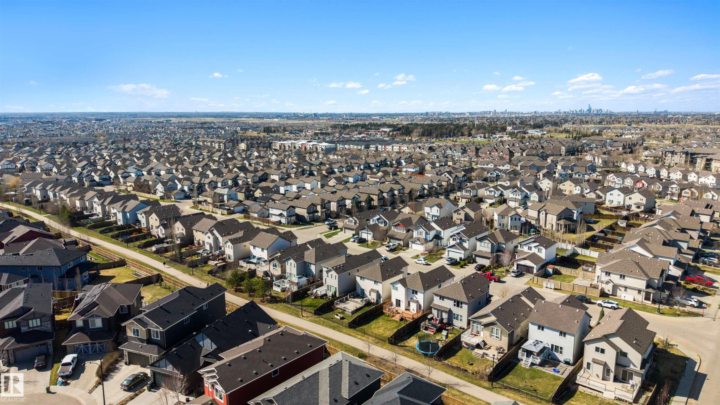 Expansive residential development featuring detached homes with varied exterior finishes and private backyards - 6115 18 Avenue, Edmonton, AB - Outdoor With View