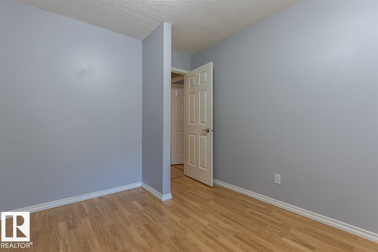 108 9010 106 Avenue, Edmonton, AB - Indoor Photo Showing Other Room