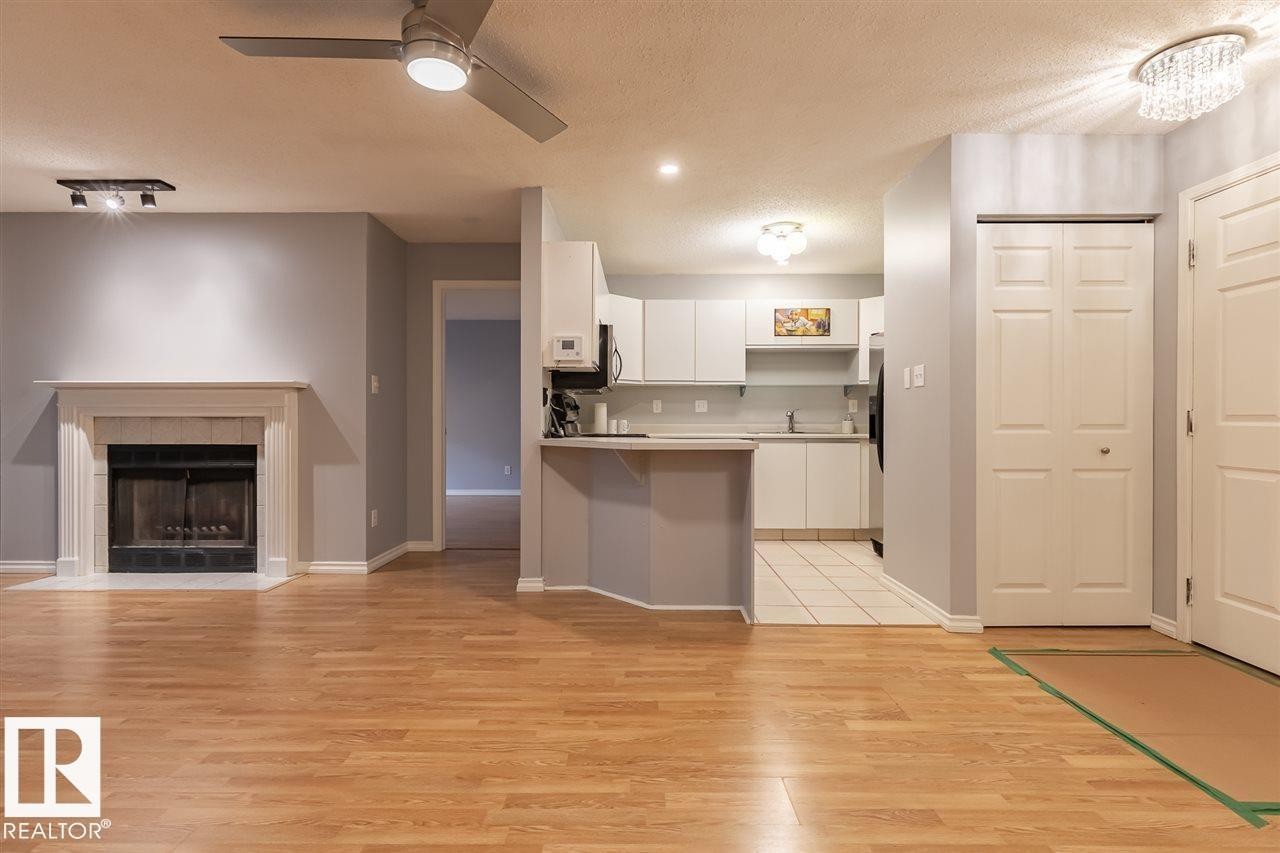 108 9010 106 Avenue, Edmonton, AB - Indoor With Fireplace