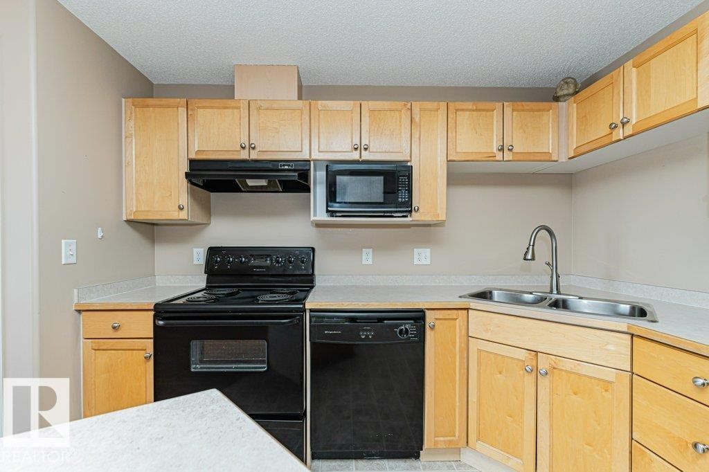 316 245 Edwards Drive, Edmonton, AB - Indoor Photo Showing Kitchen With Double Sink