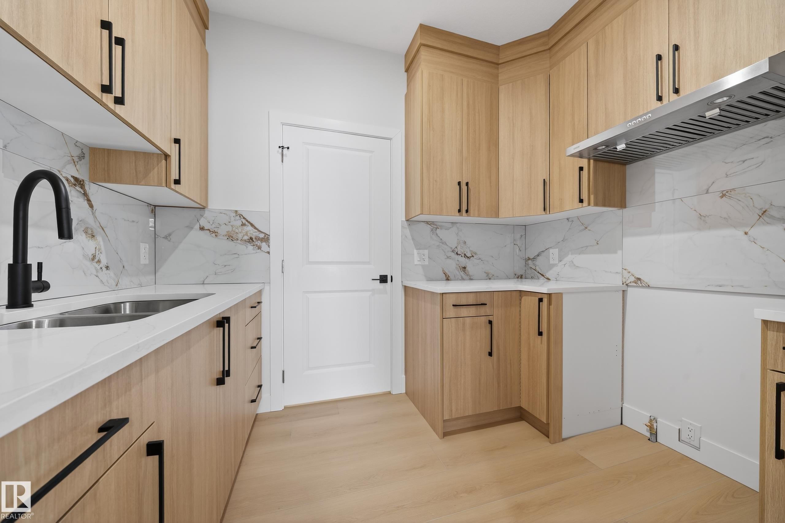 459 Crystal Creek Link, Leduc, AB - Indoor Photo Showing Kitchen With Double Sink
