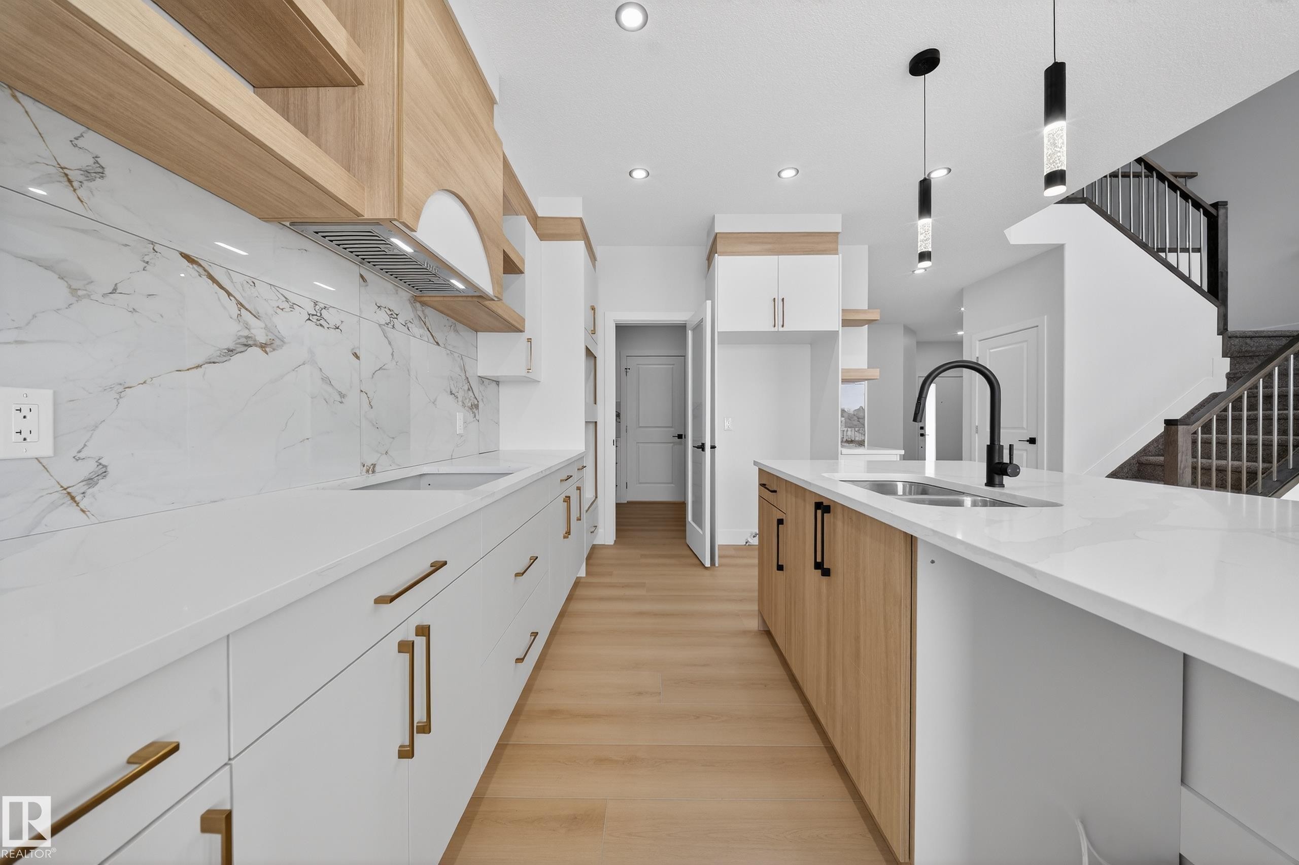 459 Crystal Creek Link, Leduc, AB - Indoor Photo Showing Kitchen With Double Sink With Upgraded Kitchen