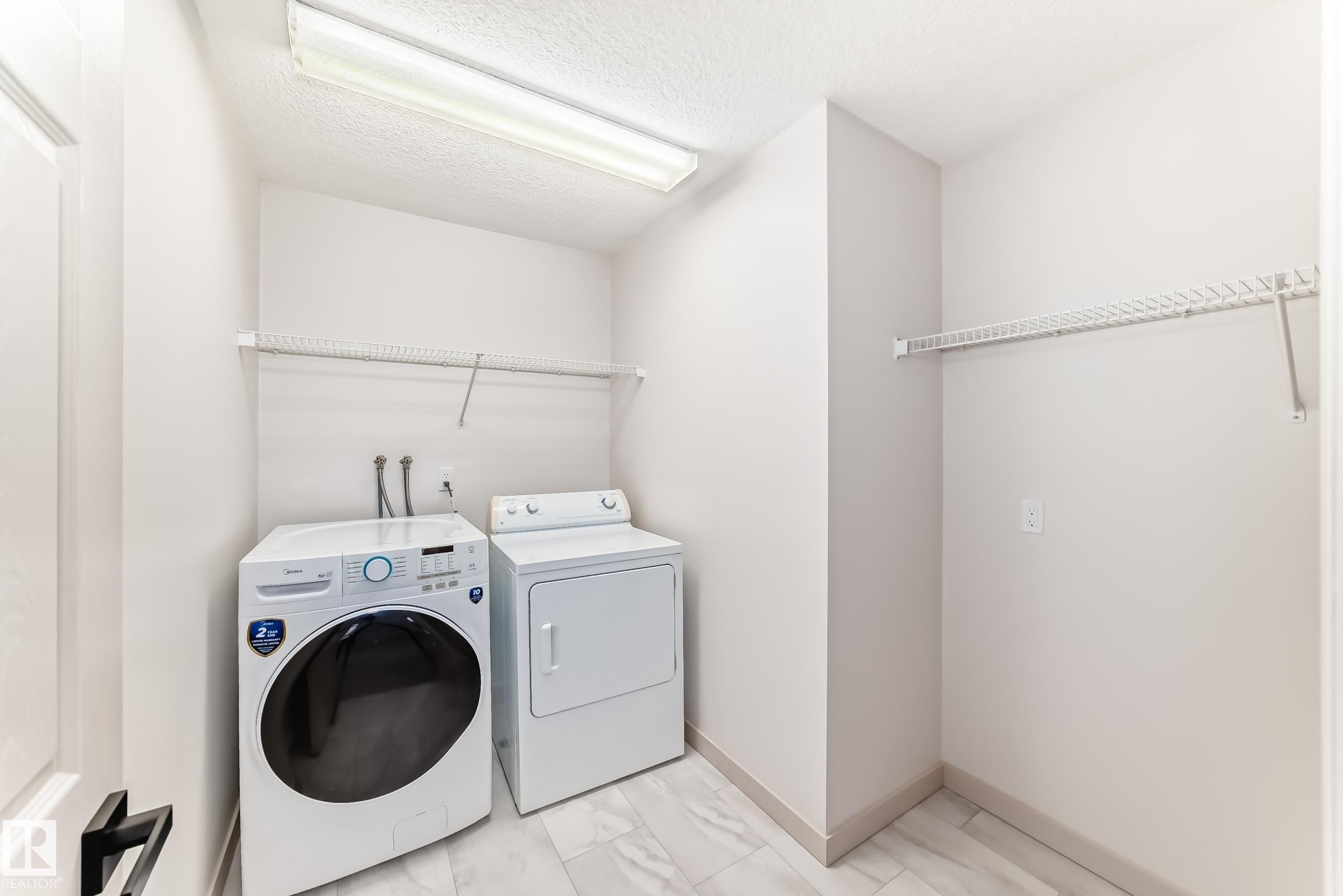 13519 32 Street, Edmonton, AB - Indoor Photo Showing Laundry Room