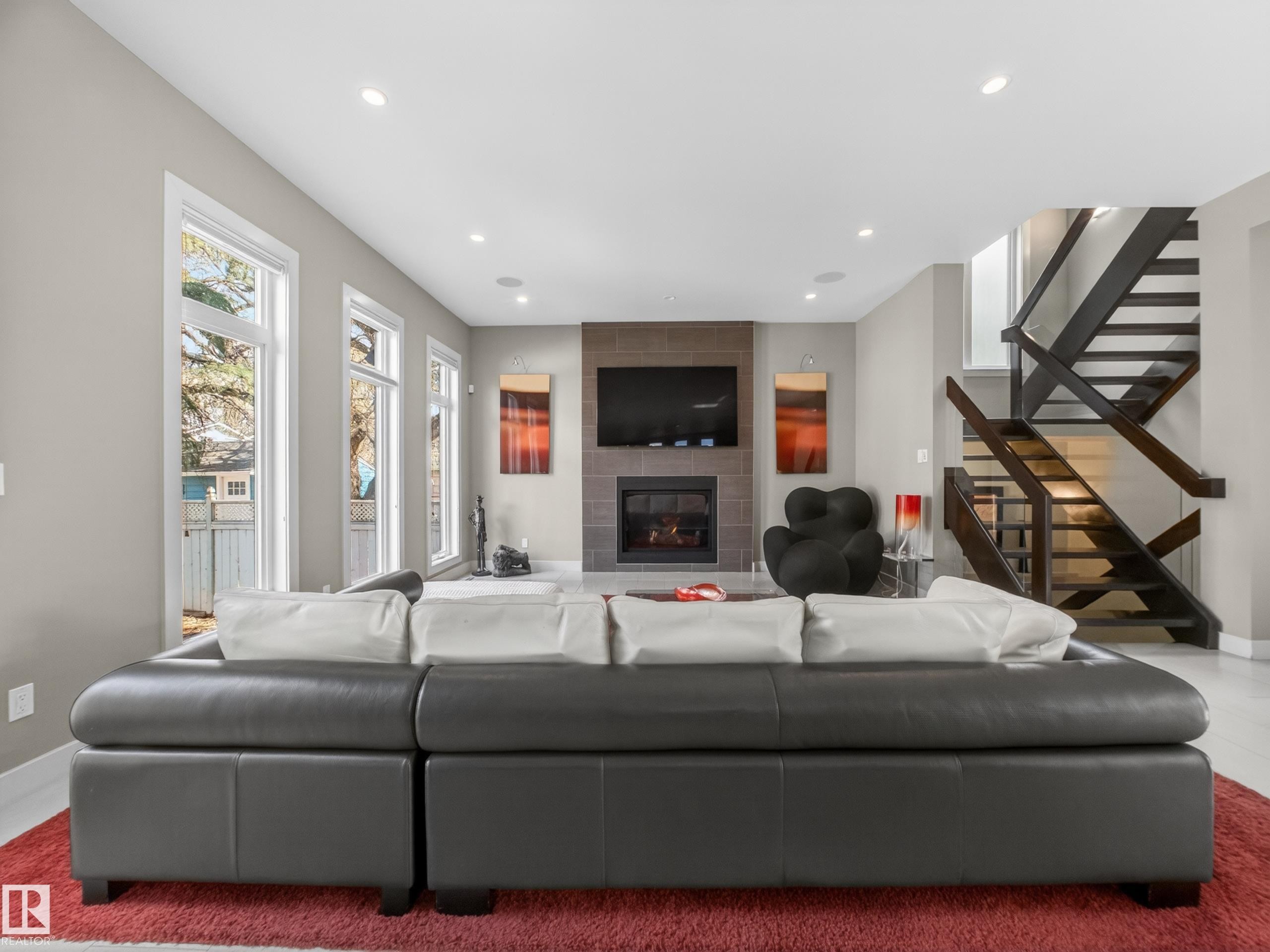 10650 66 Avenue, Edmonton, AB - Indoor Photo Showing Living Room With Fireplace