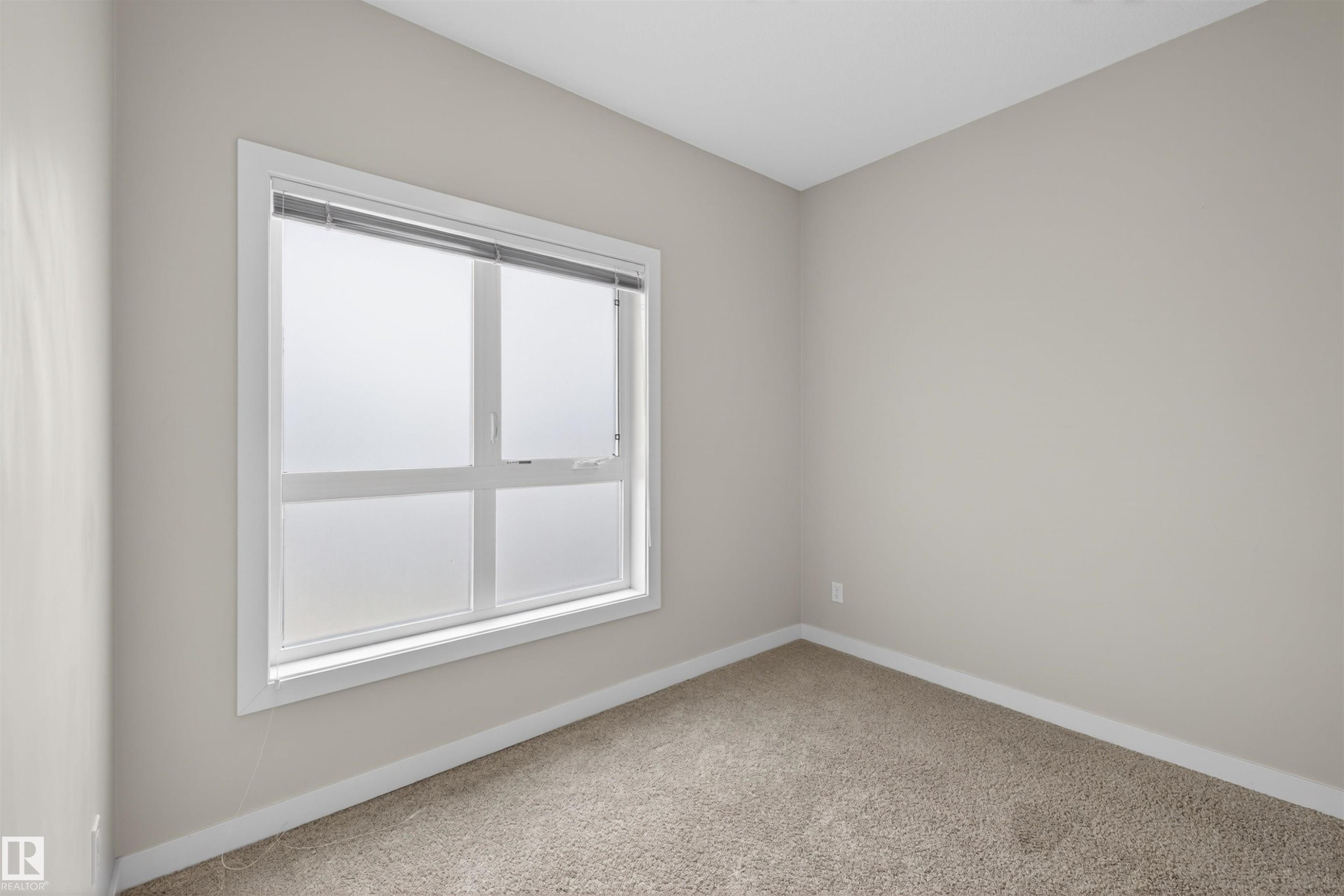 8 2560 Pegasus Boulevard, Edmonton, AB - Indoor Photo Showing Other Room
