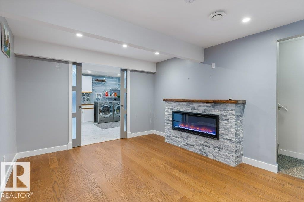 16 4 Fraser Drive, St. Albert, AB - Indoor Photo Showing Living Room With Fireplace