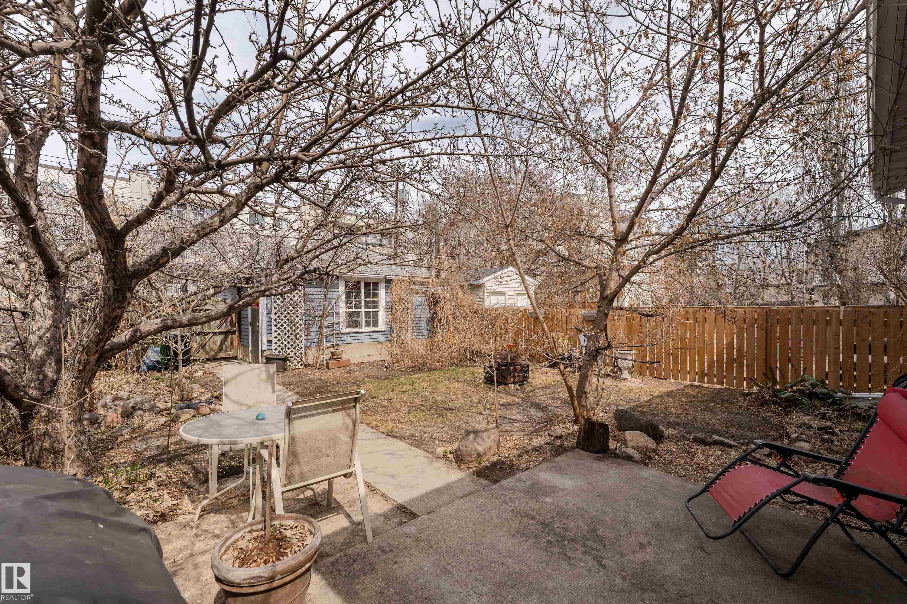 Private yard with fruit trees, gated, access to single oversized garage - 10956 81 Avenue, Edmonton, AB - Outdoor